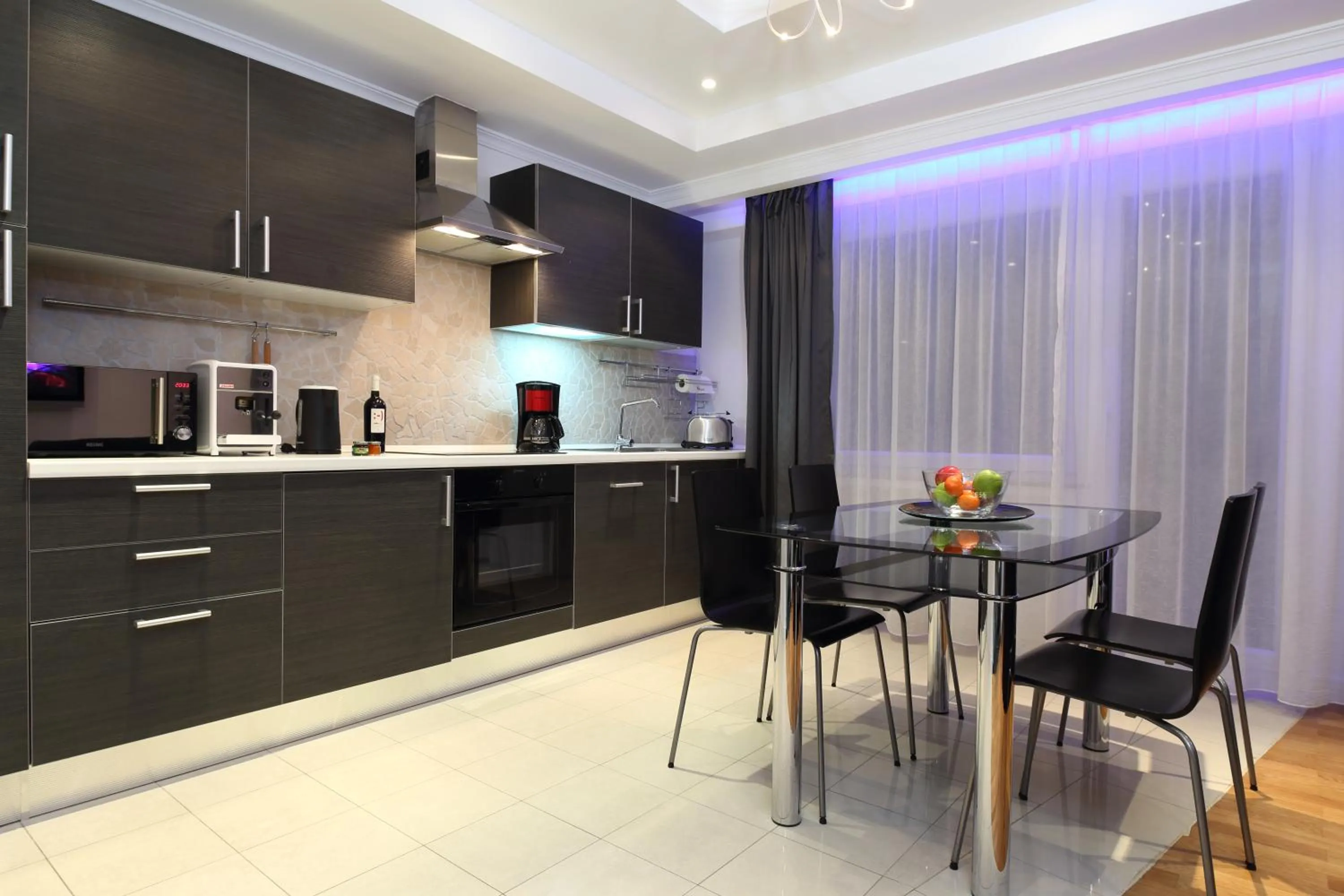 Kitchen or kitchenette in The Queen Luxury Apartments - Villa Giada