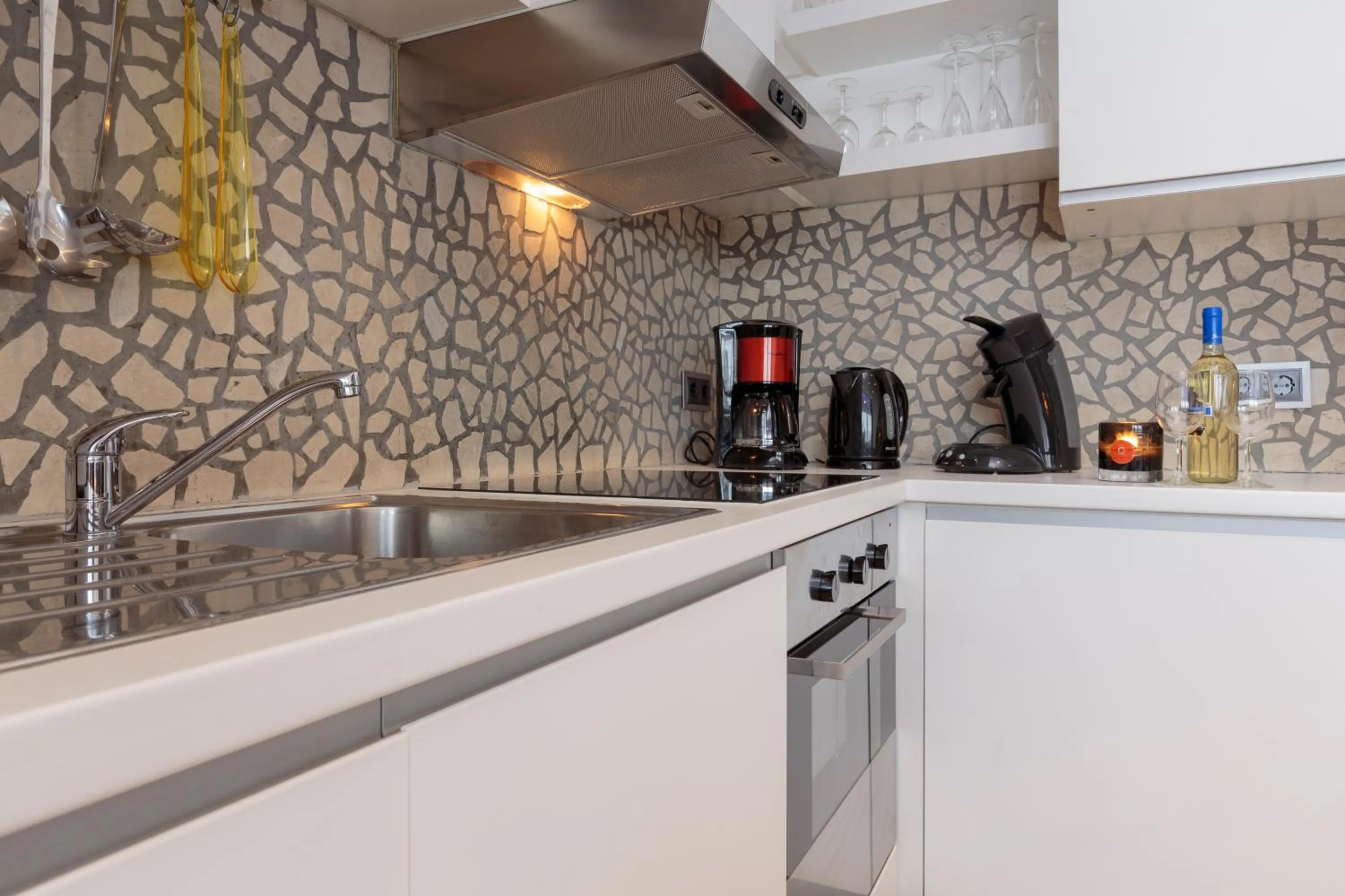Kitchen or kitchenette in The Queen Luxury Apartments - Villa Giada