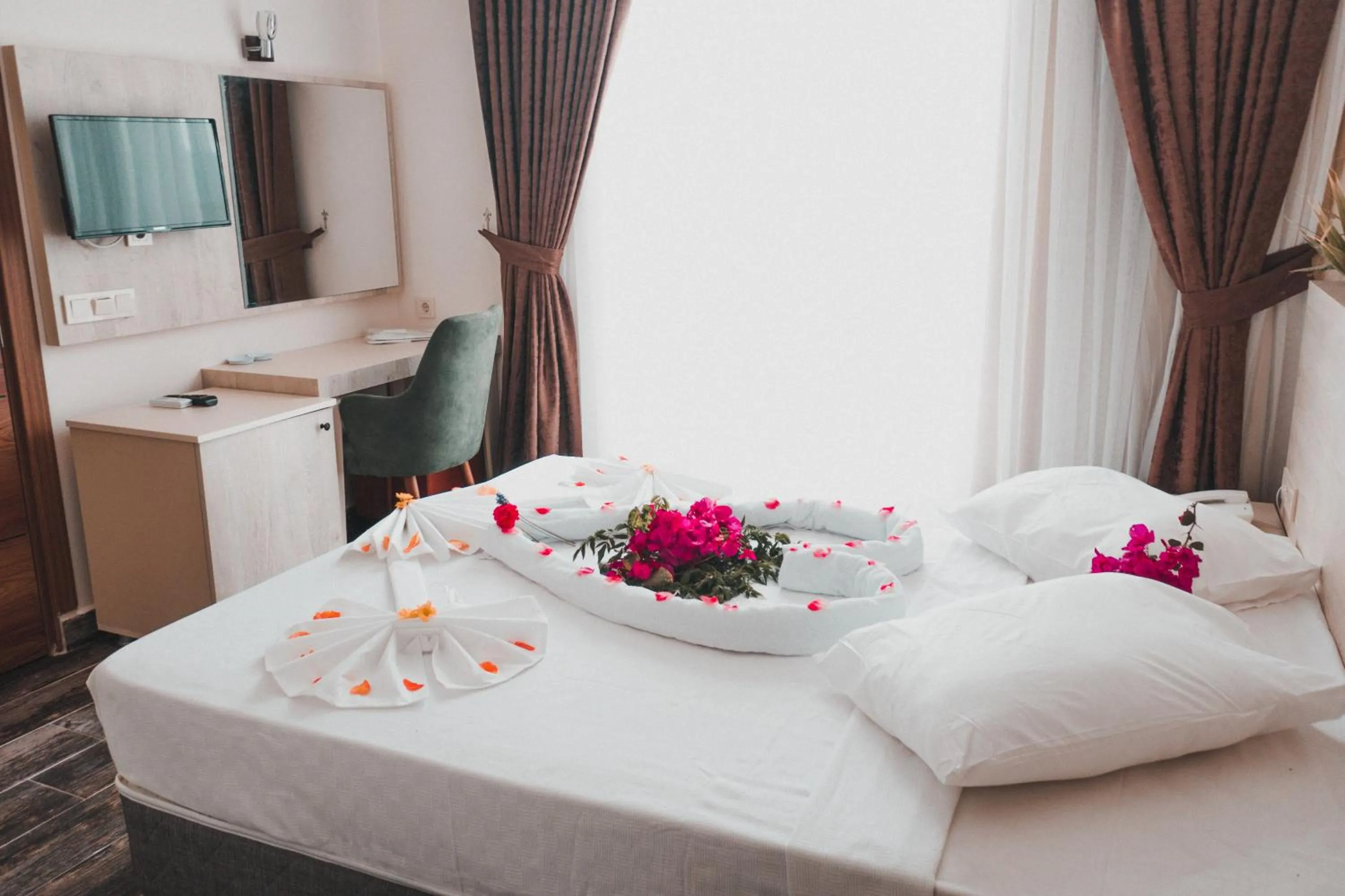 Bed in Dream Town Hotel&Restaurant