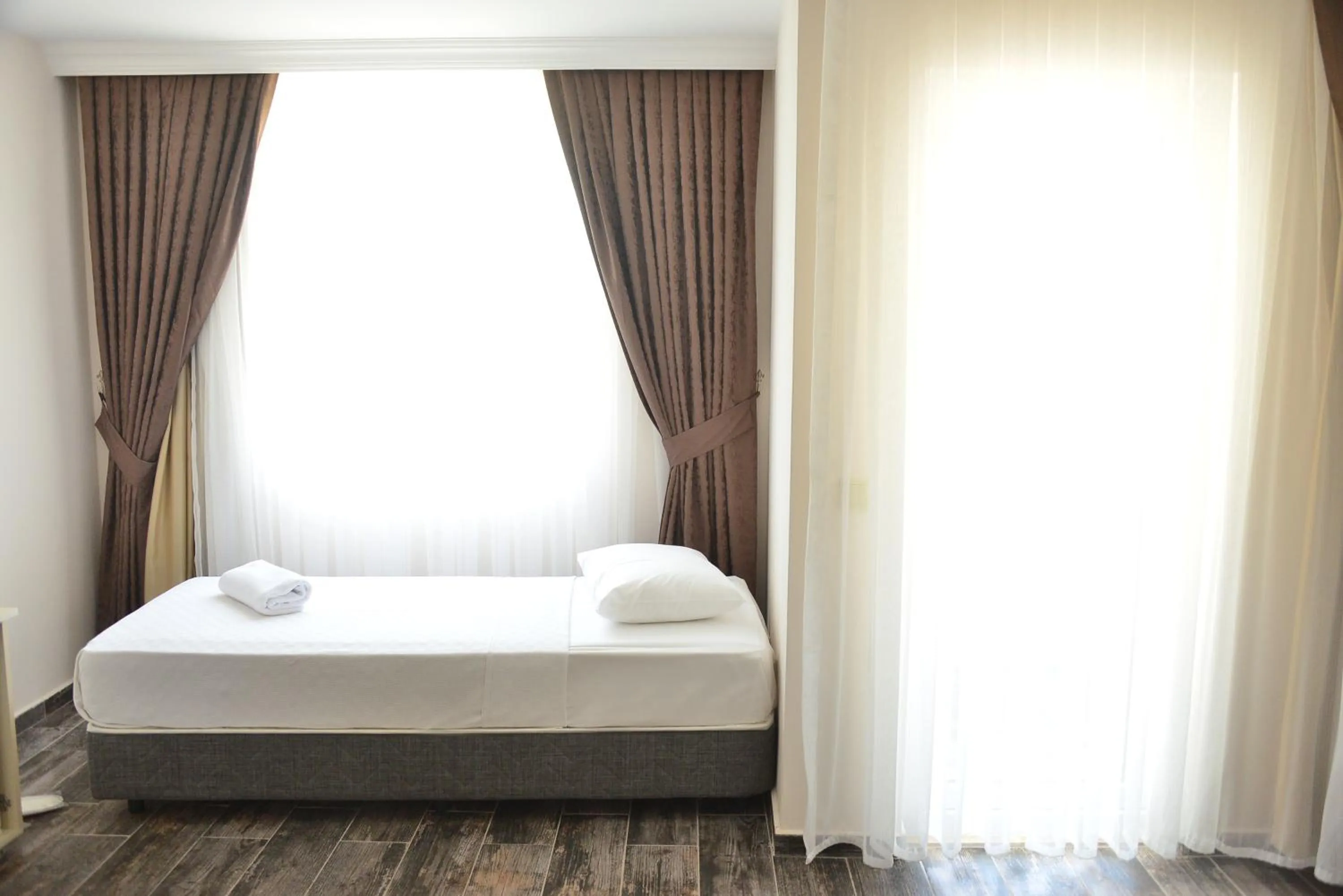 Bed in Dream Town Hotel&Restaurant