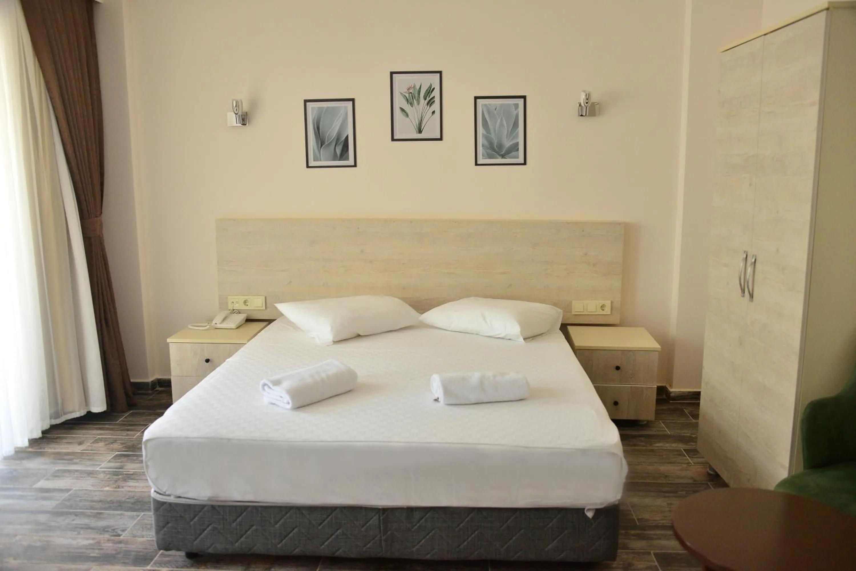 Bedroom, Bed in Dream Town Hotel&Restaurant