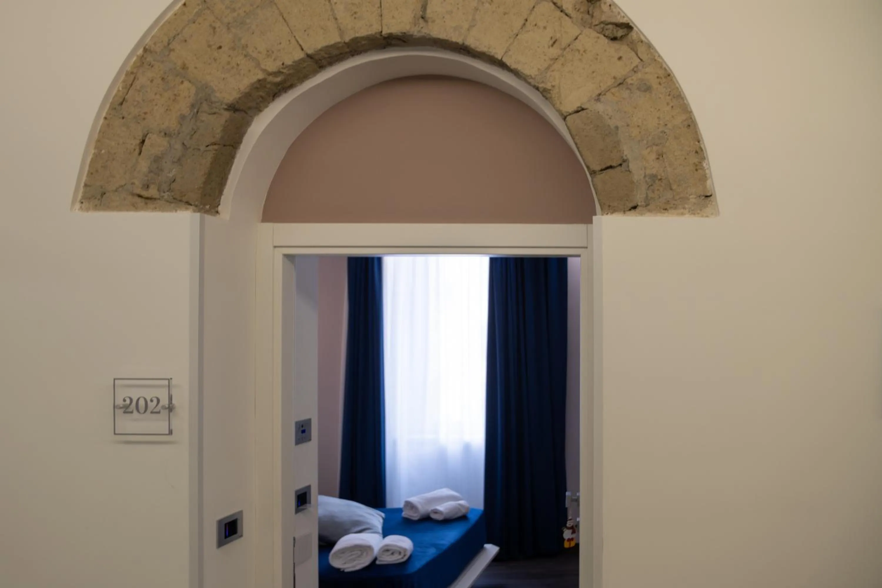 Photo of the whole room, Bed in Palazzo Cappuccini Art Relais