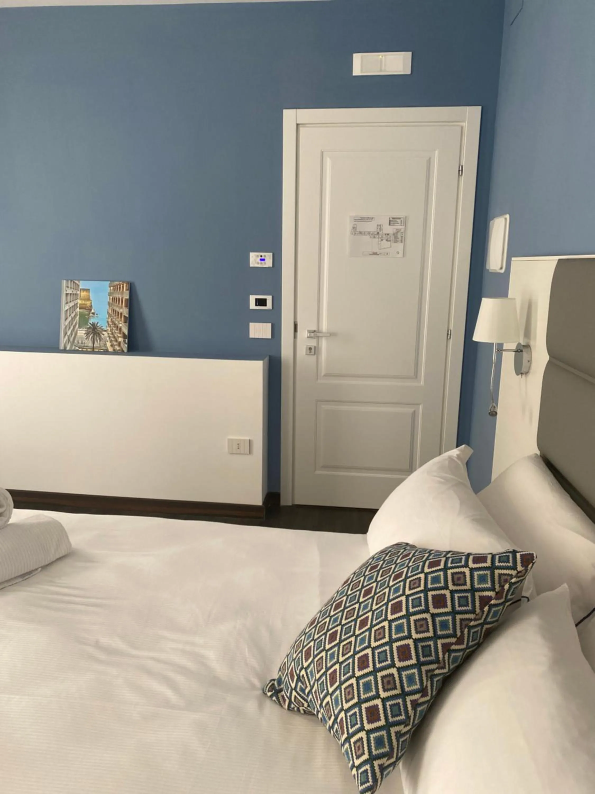 Bed in Palazzo Cappuccini Art Relais