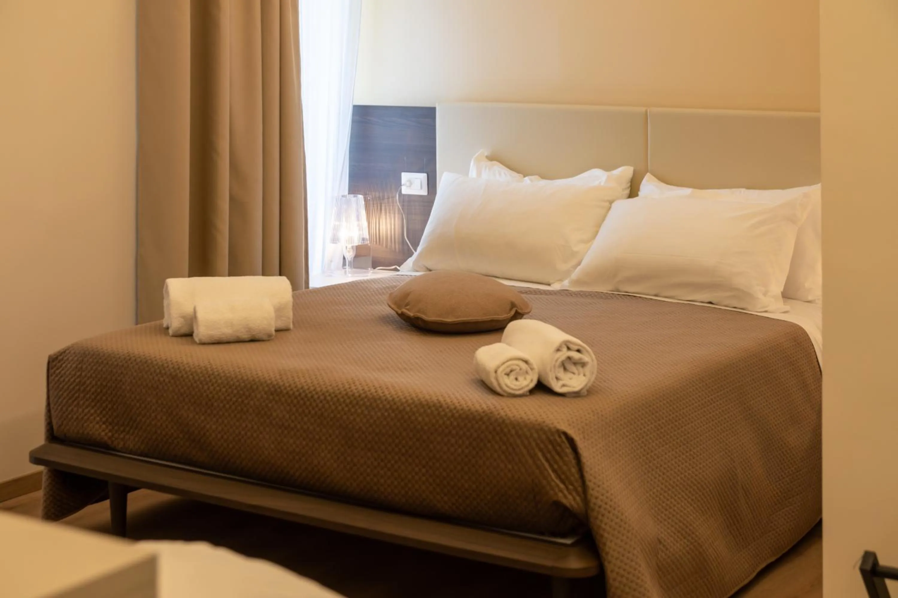 Bed in Palazzo Cappuccini Art Relais