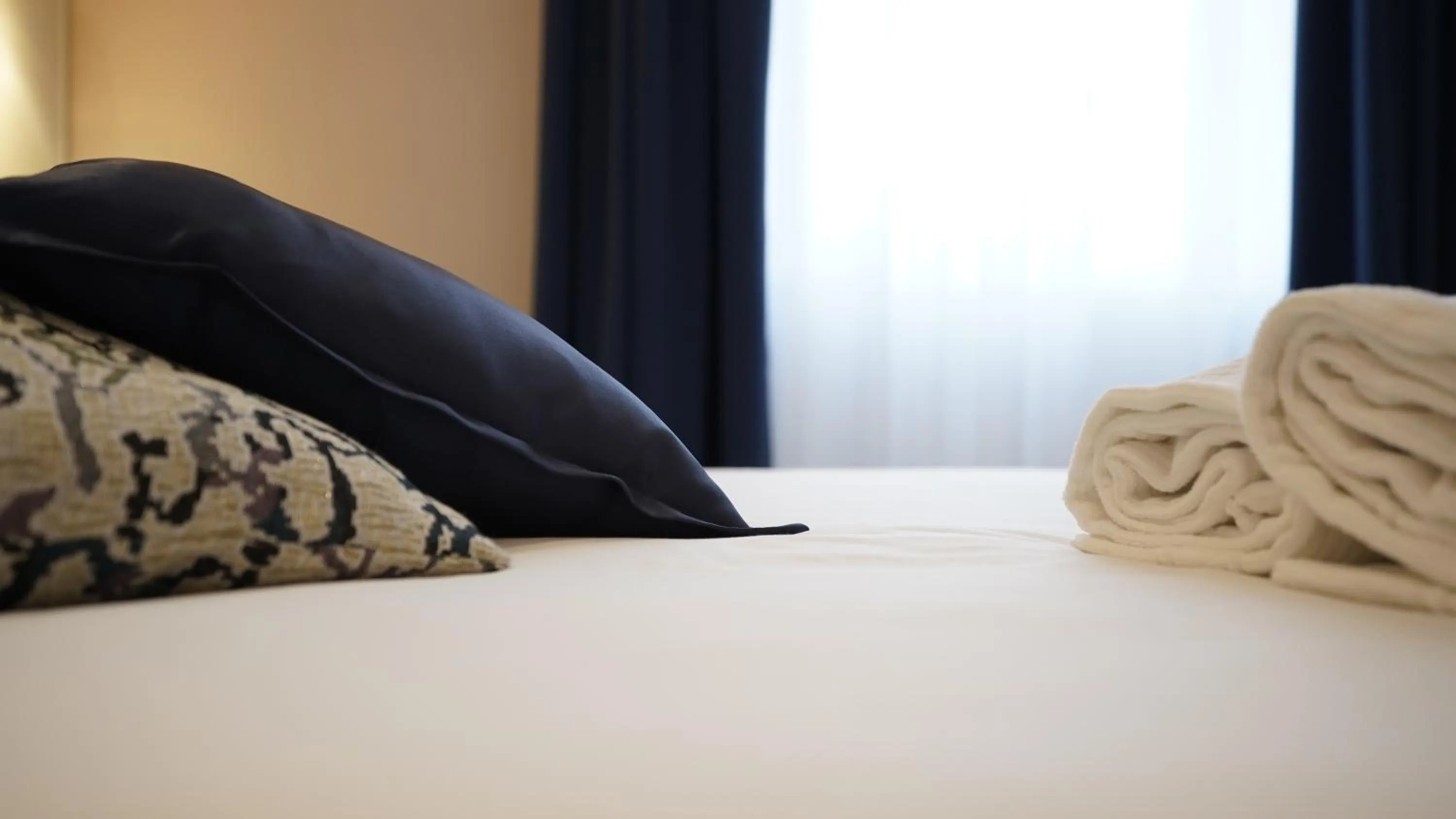 Bed in Palazzo Cappuccini Art Relais