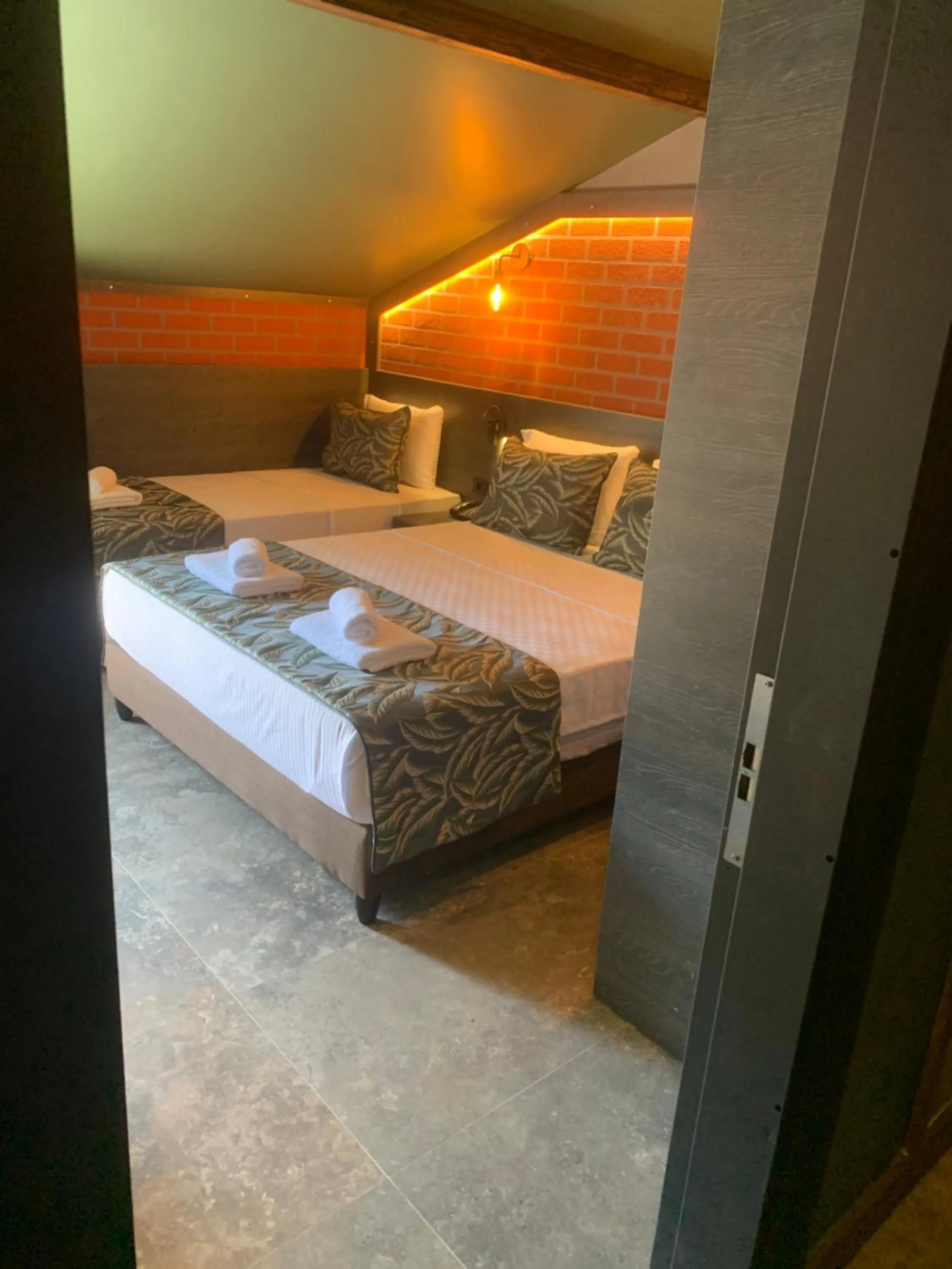 Bed in Dolphin Park Hotel