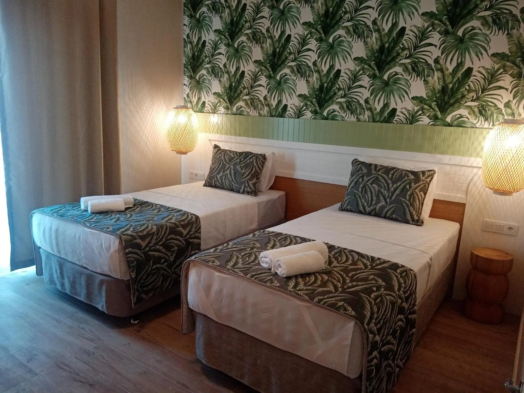 Bed in Dolphin Park Hotel