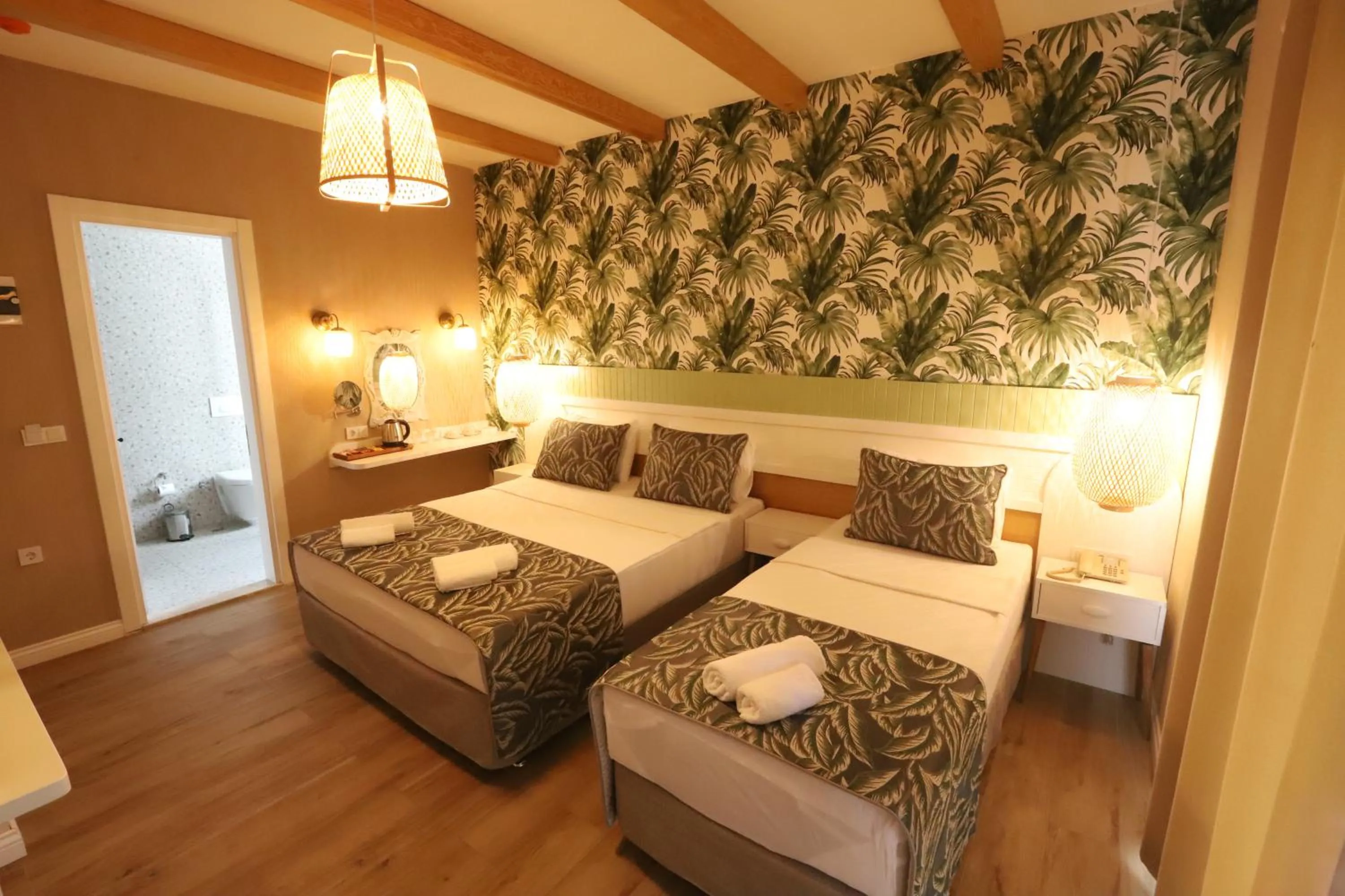 Bed in Dolphin Park Hotel