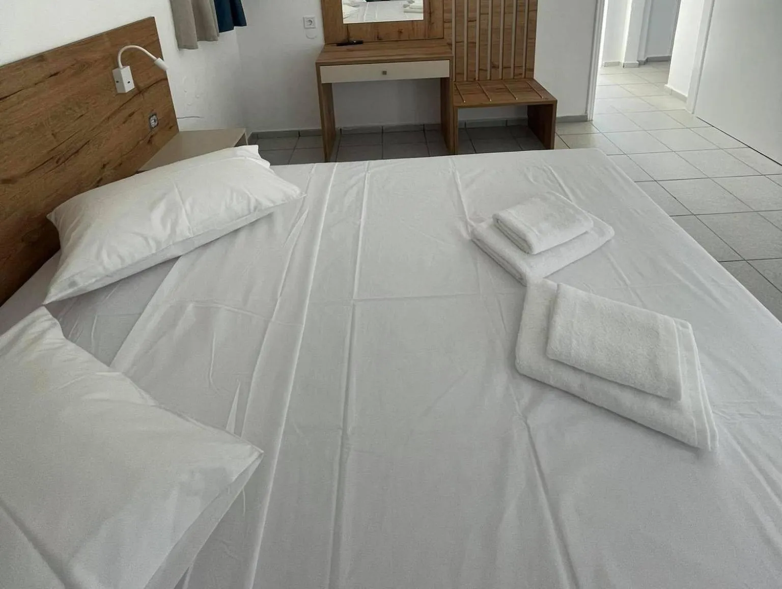 Bed in Coralli Beach Hotel
