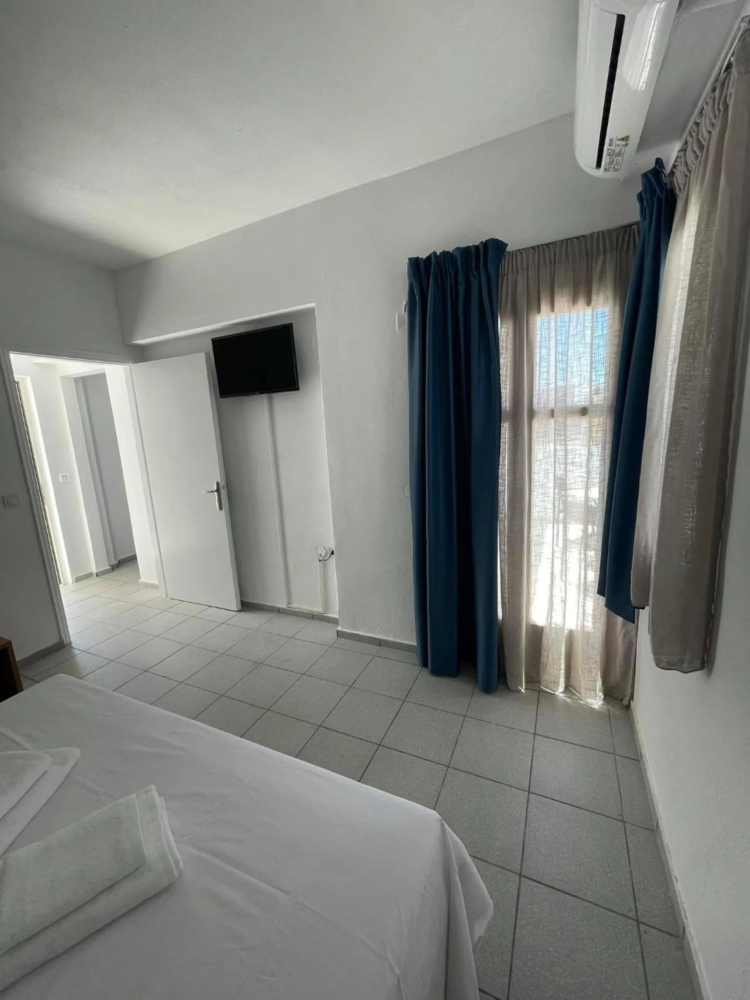 Bed in Coralli Beach Hotel