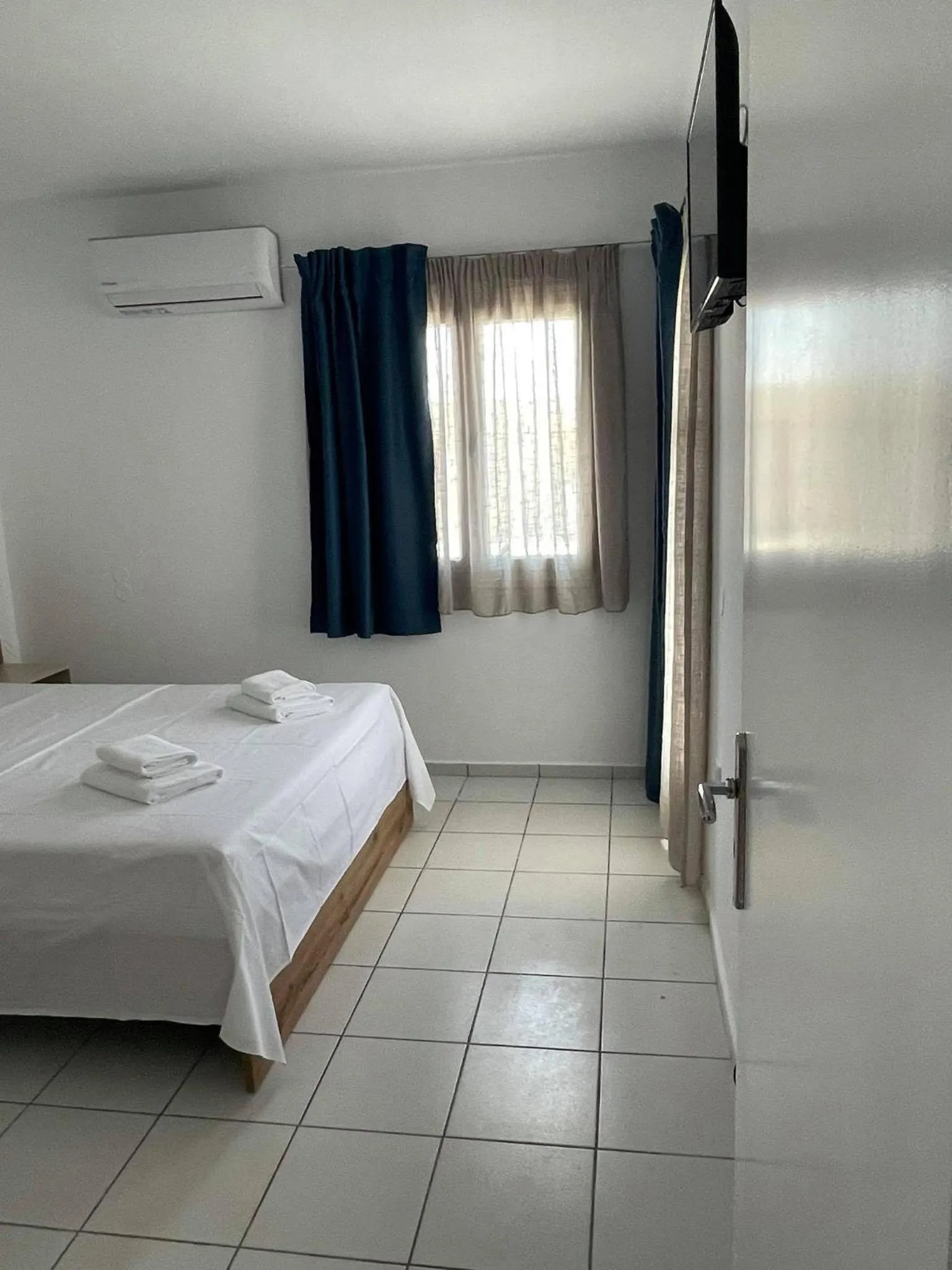 Bed in Coralli Beach Hotel