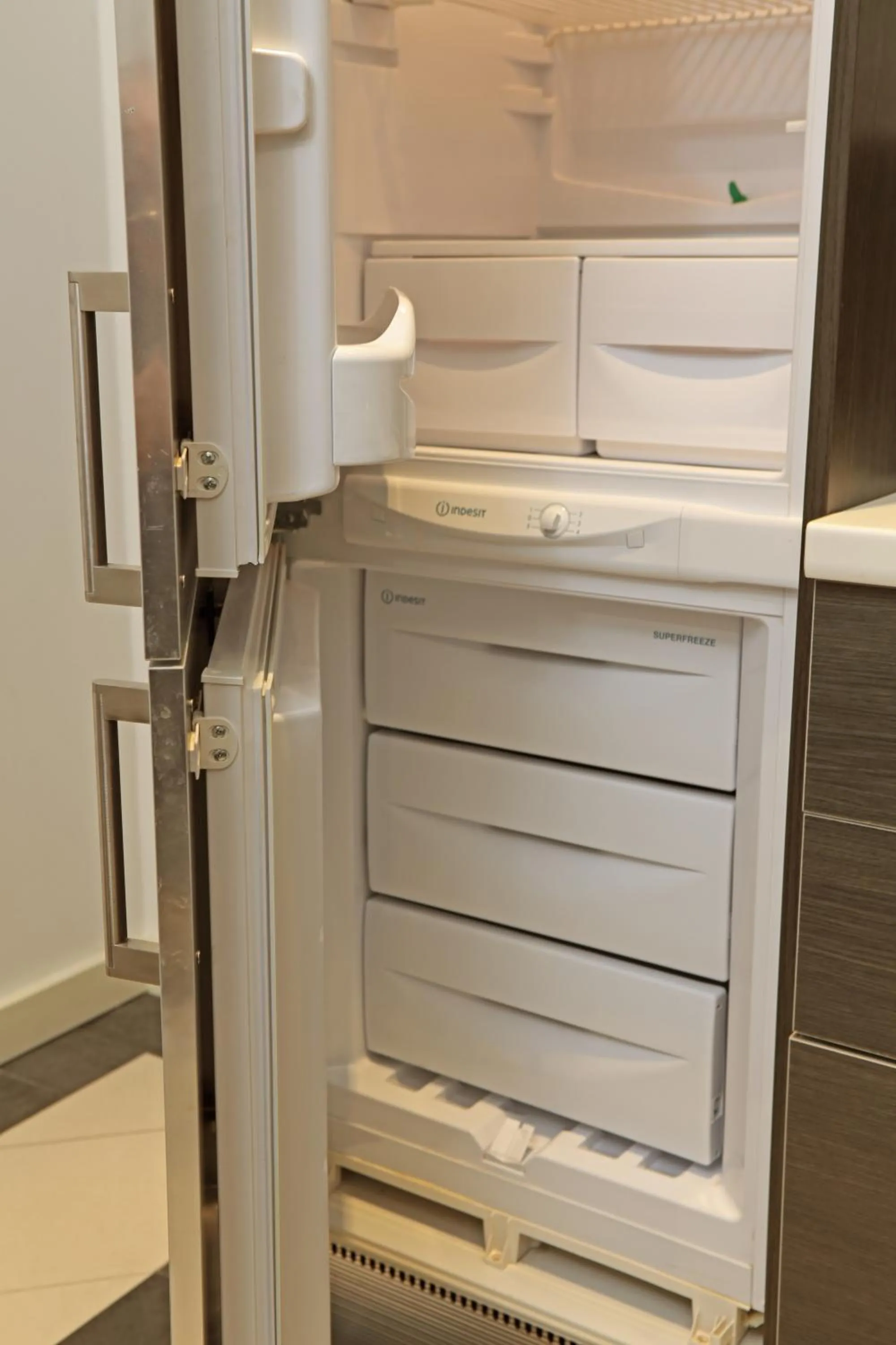 Kitchen or kitchenette in The Queen Luxury Apartments - Villa Liberty