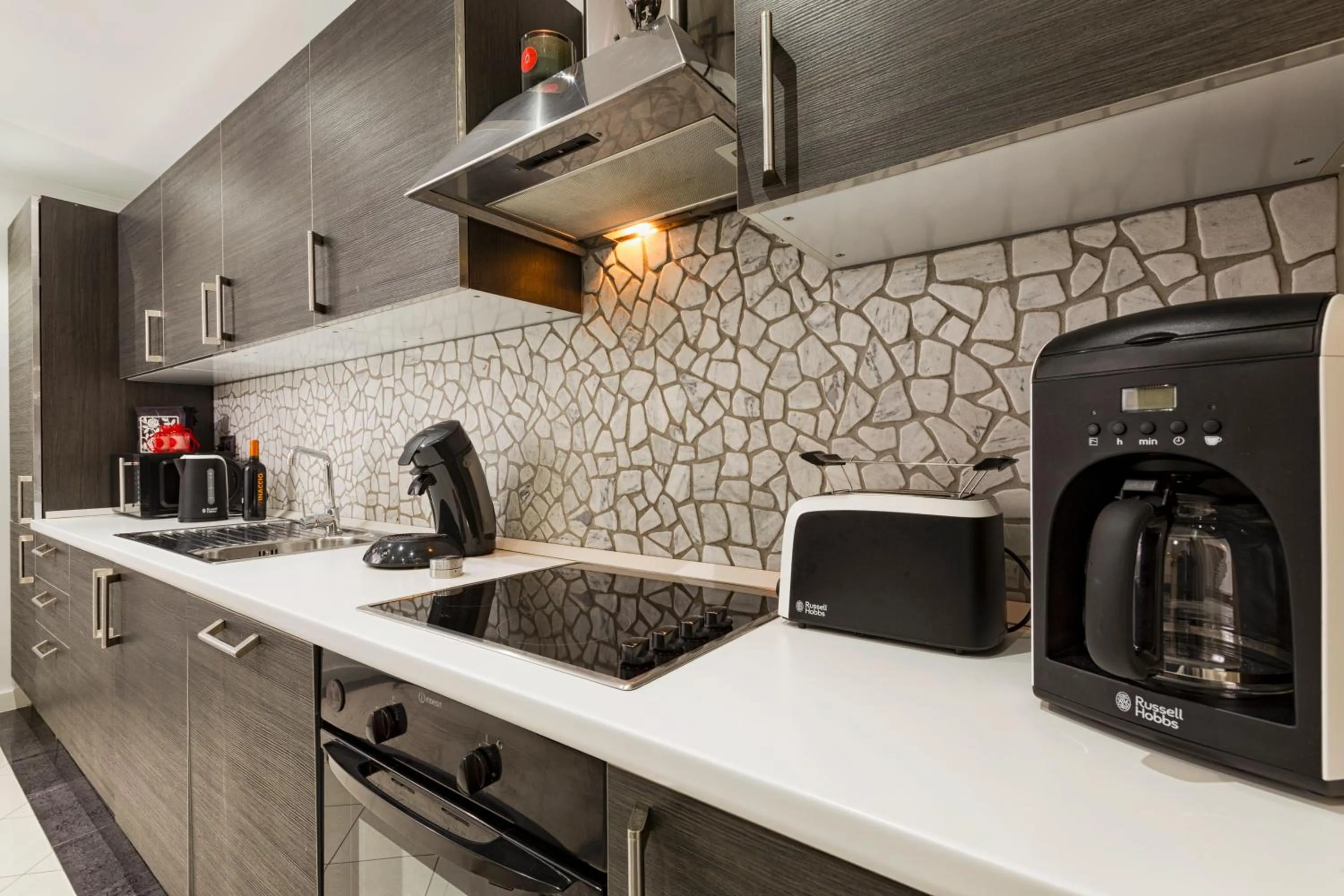 stove in The Queen Luxury Apartments - Villa Liberty