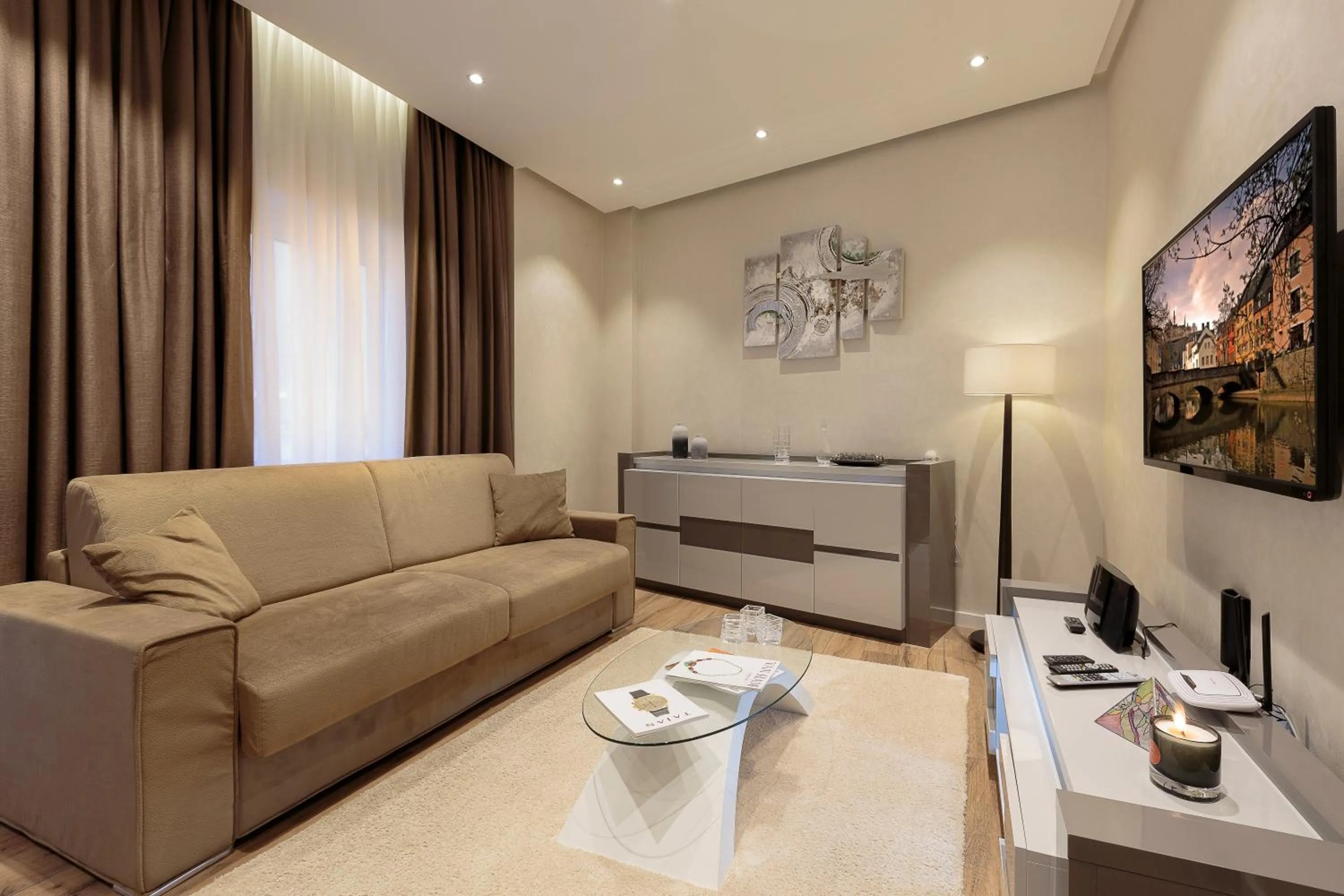 TV and multimedia in The Queen Luxury Apartments - Villa Liberty