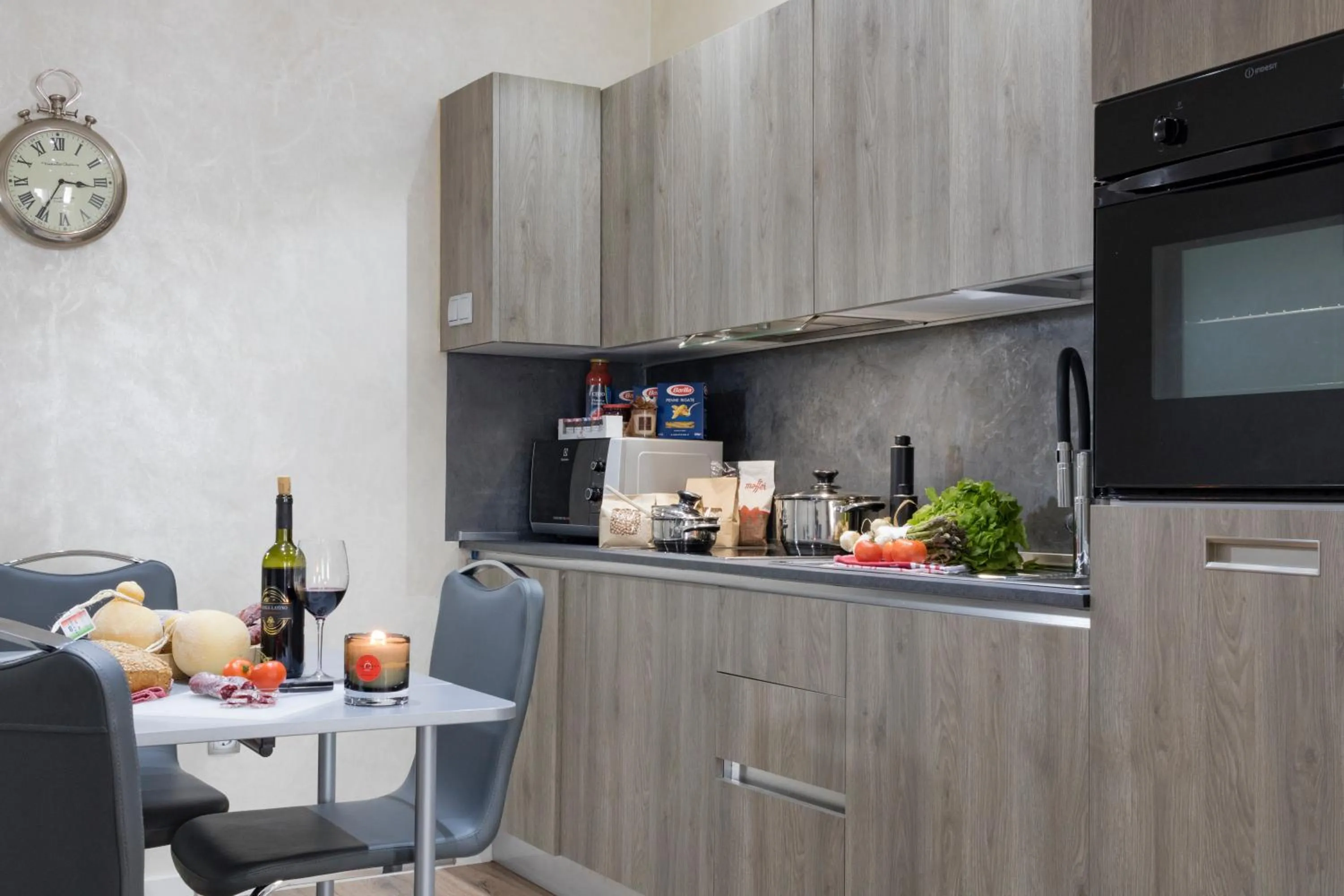 Kitchen or kitchenette in The Queen Luxury Apartments - Villa Liberty