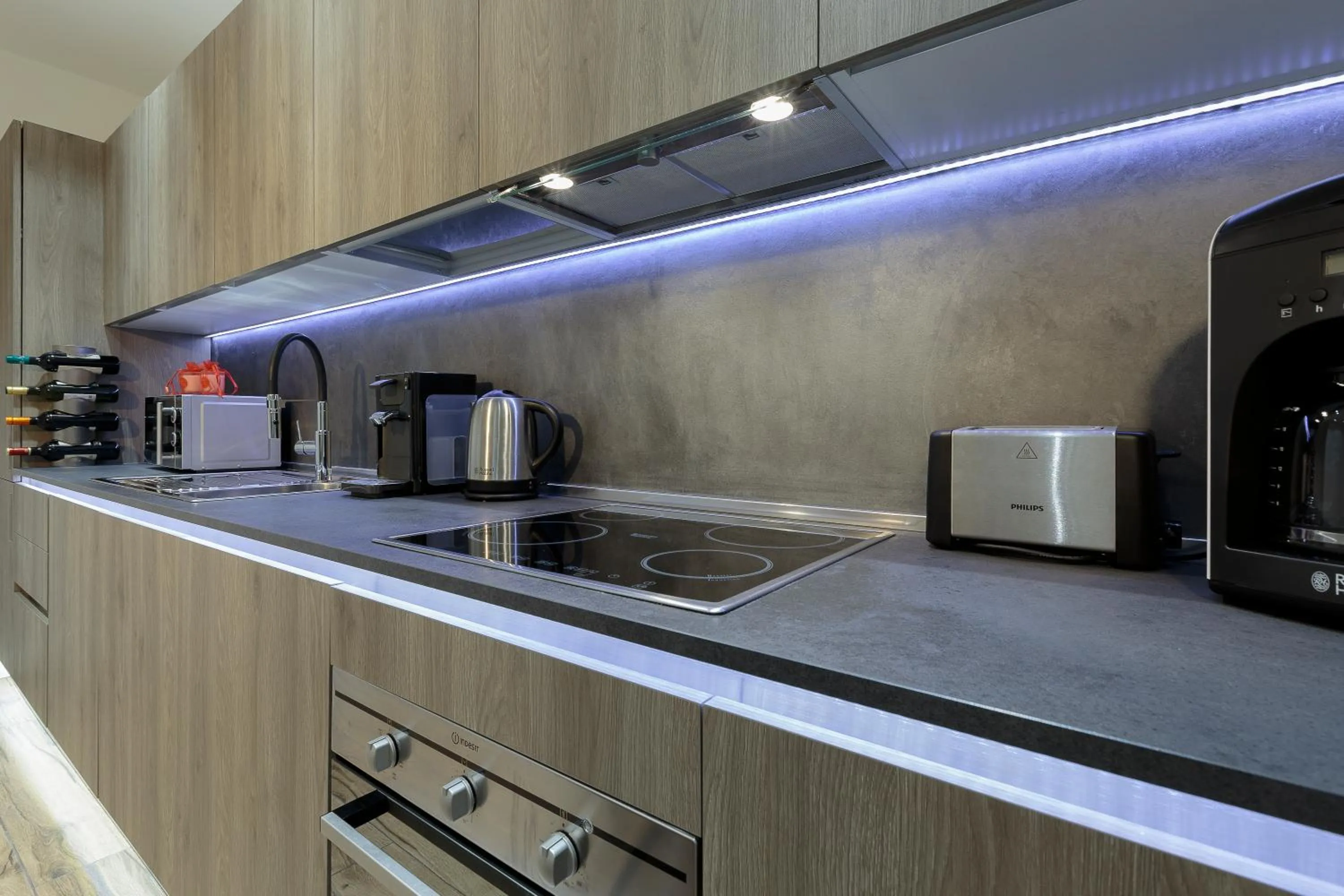 Kitchen or kitchenette in The Queen Luxury Apartments - Villa Liberty