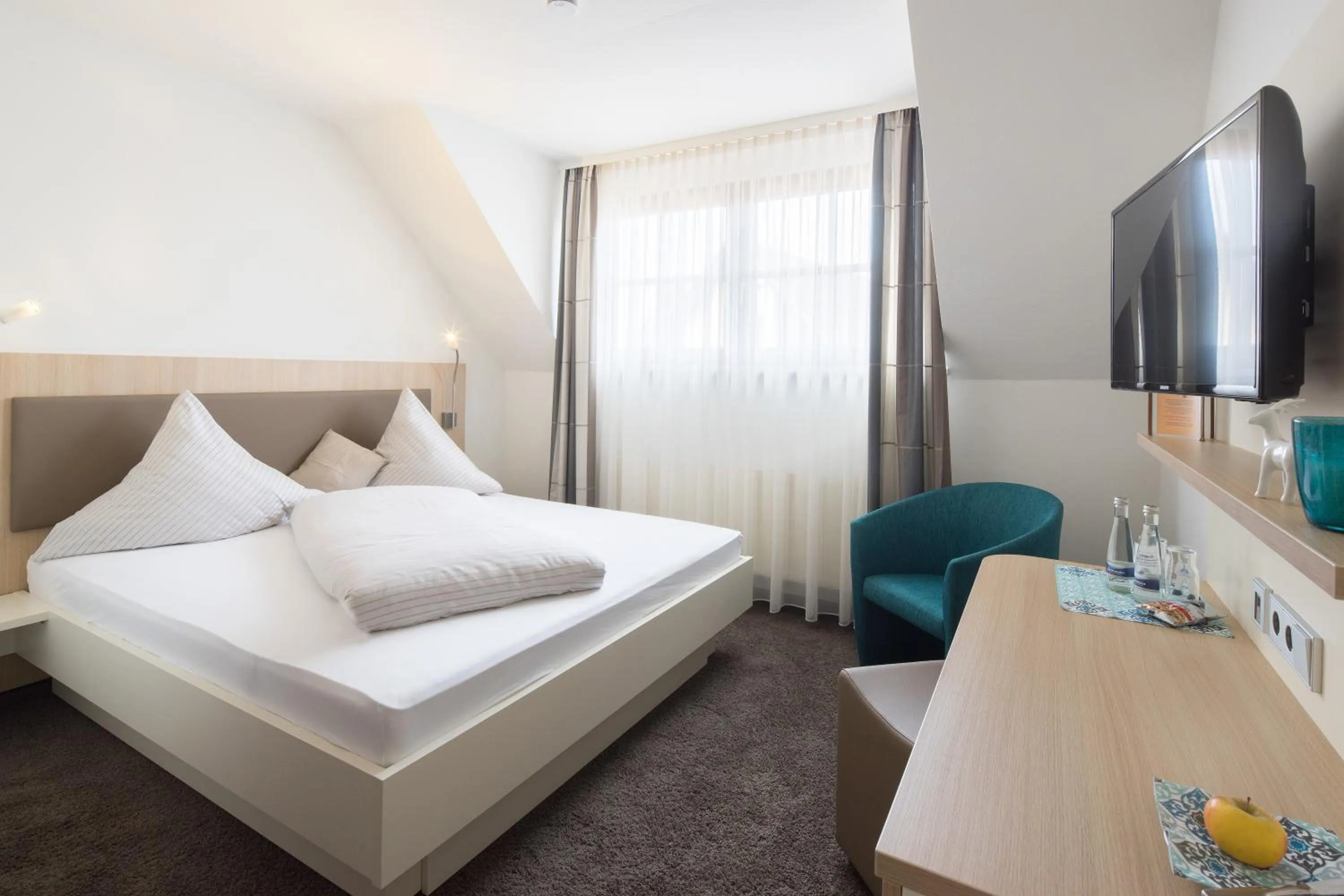 Photo of the whole room, Bed in Kohlers Hotel Engel