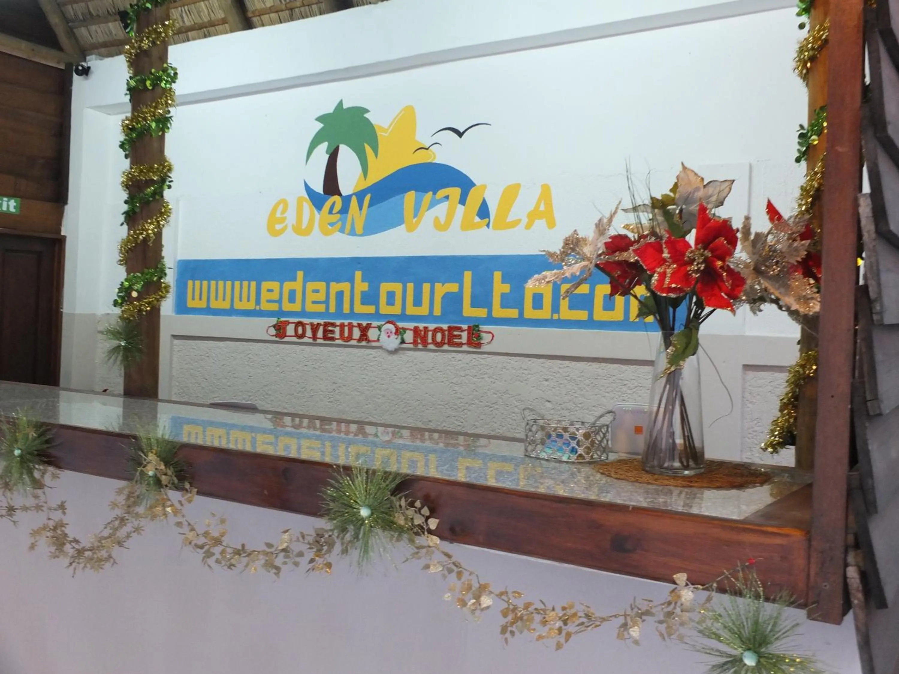 Property logo or sign in Eden Villa