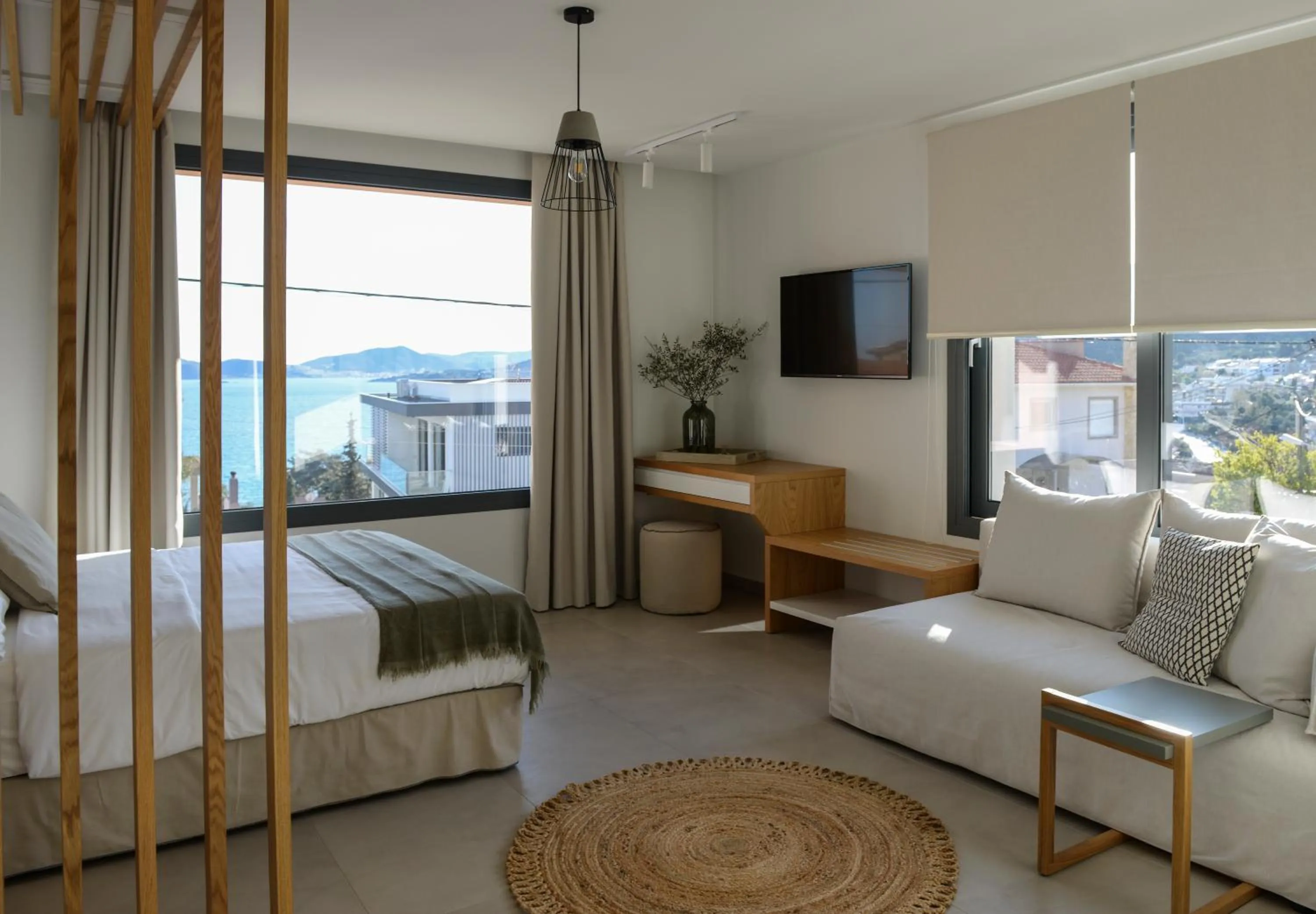 Bed in MARAVILLA SUITES