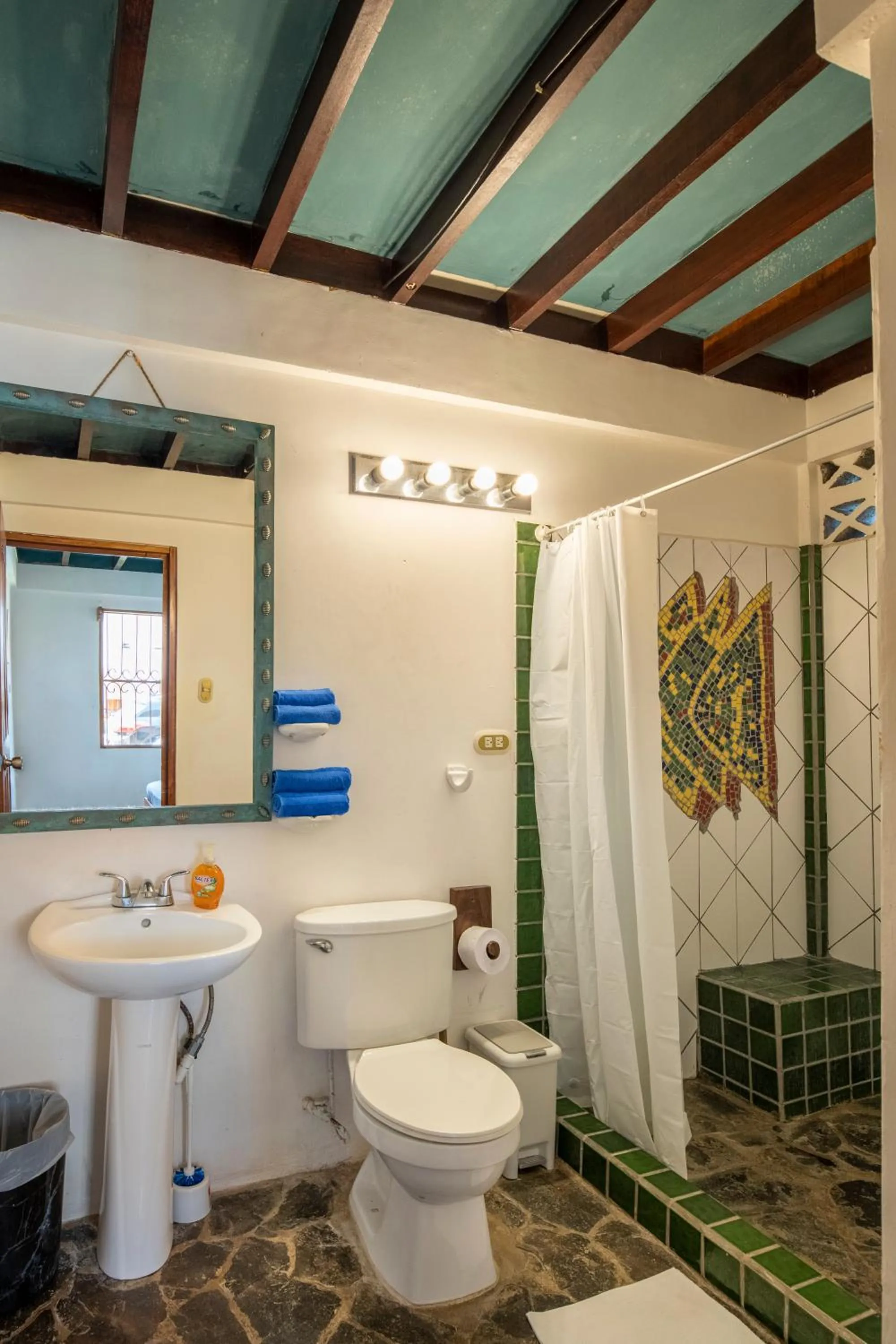 Shower in Pangea Lodge with Shared Pool at the Heart of Manzanillo