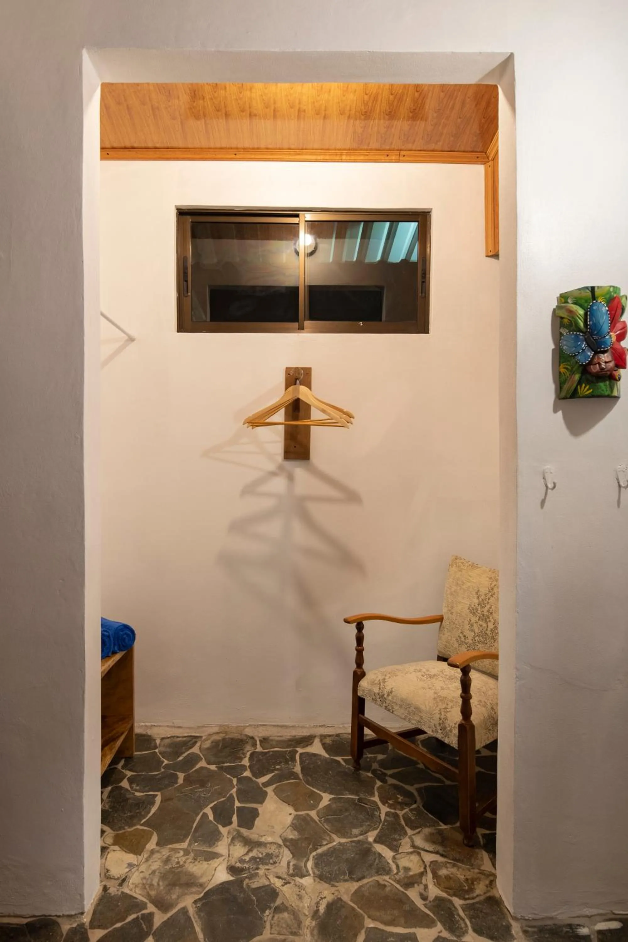 Seating area in Pangea Lodge with Shared Pool at the Heart of Manzanillo