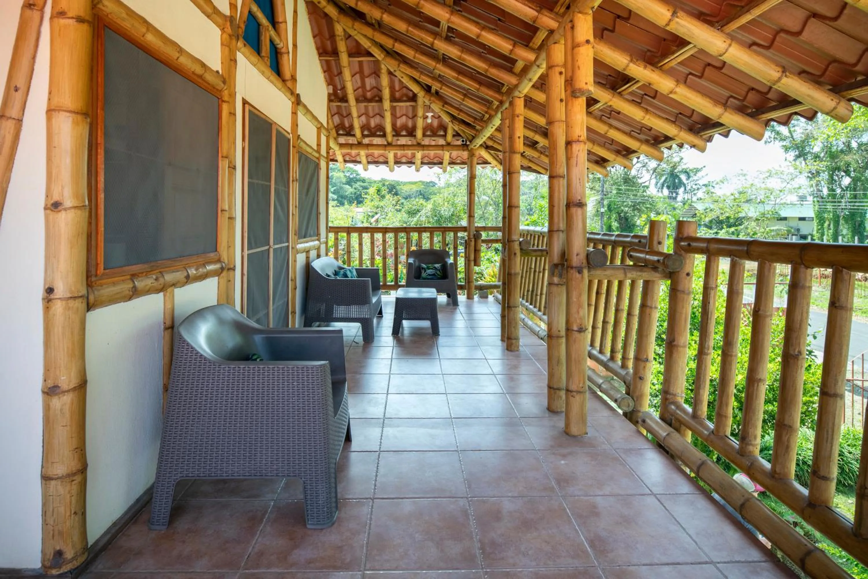 Patio in Pangea Lodge with Shared Pool at the Heart of Manzanillo