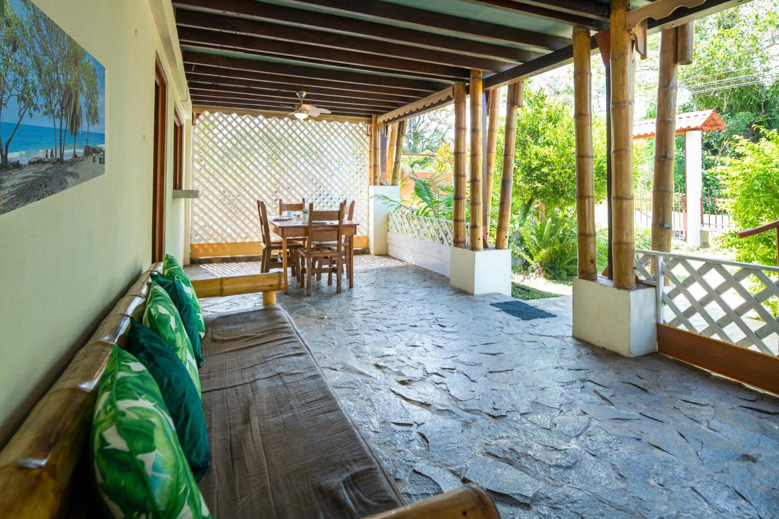 Seating area in Pangea Lodge with Shared Pool at the Heart of Manzanillo