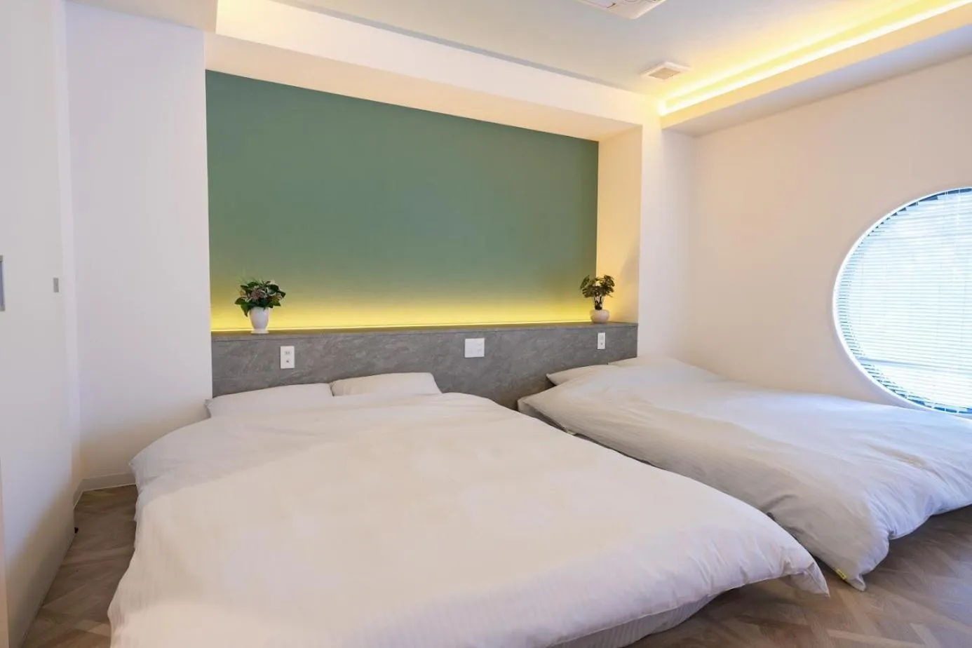 Bed in Pinpon Hotel Hiroshima