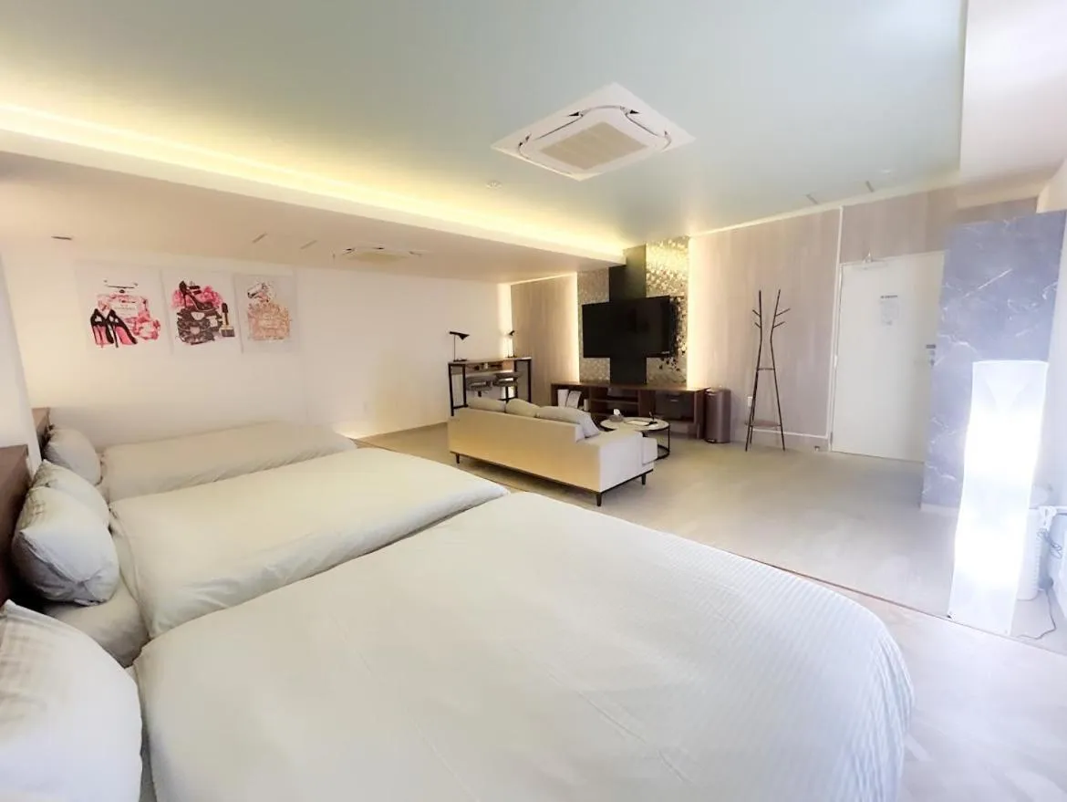 Bed in Pinpon Hotel Hiroshima