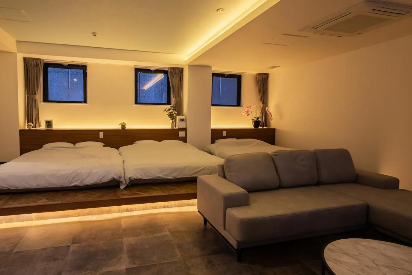 Bed in Pinpon Hotel Hiroshima