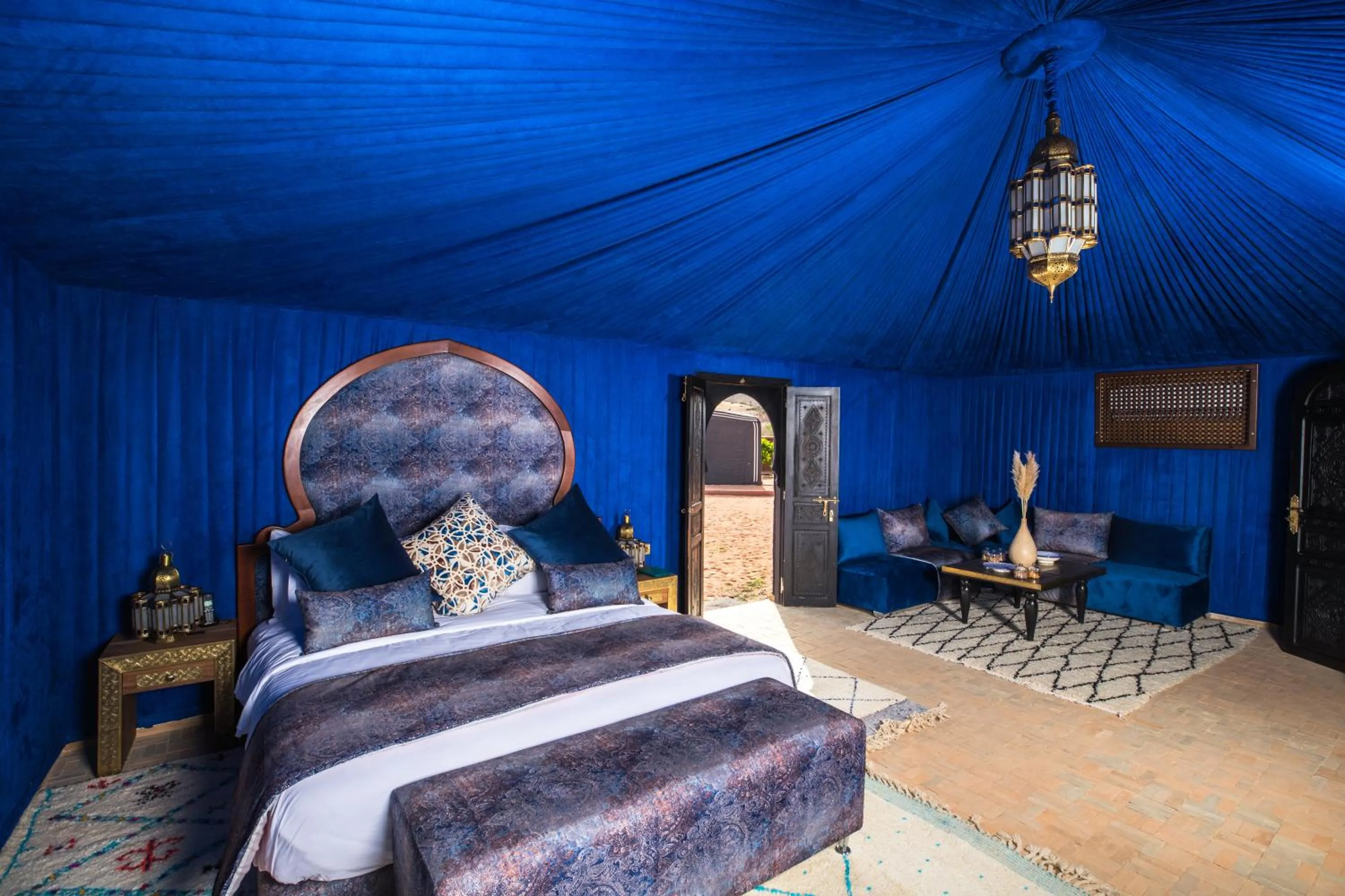 Bed in Kalyptus Luxury Camp