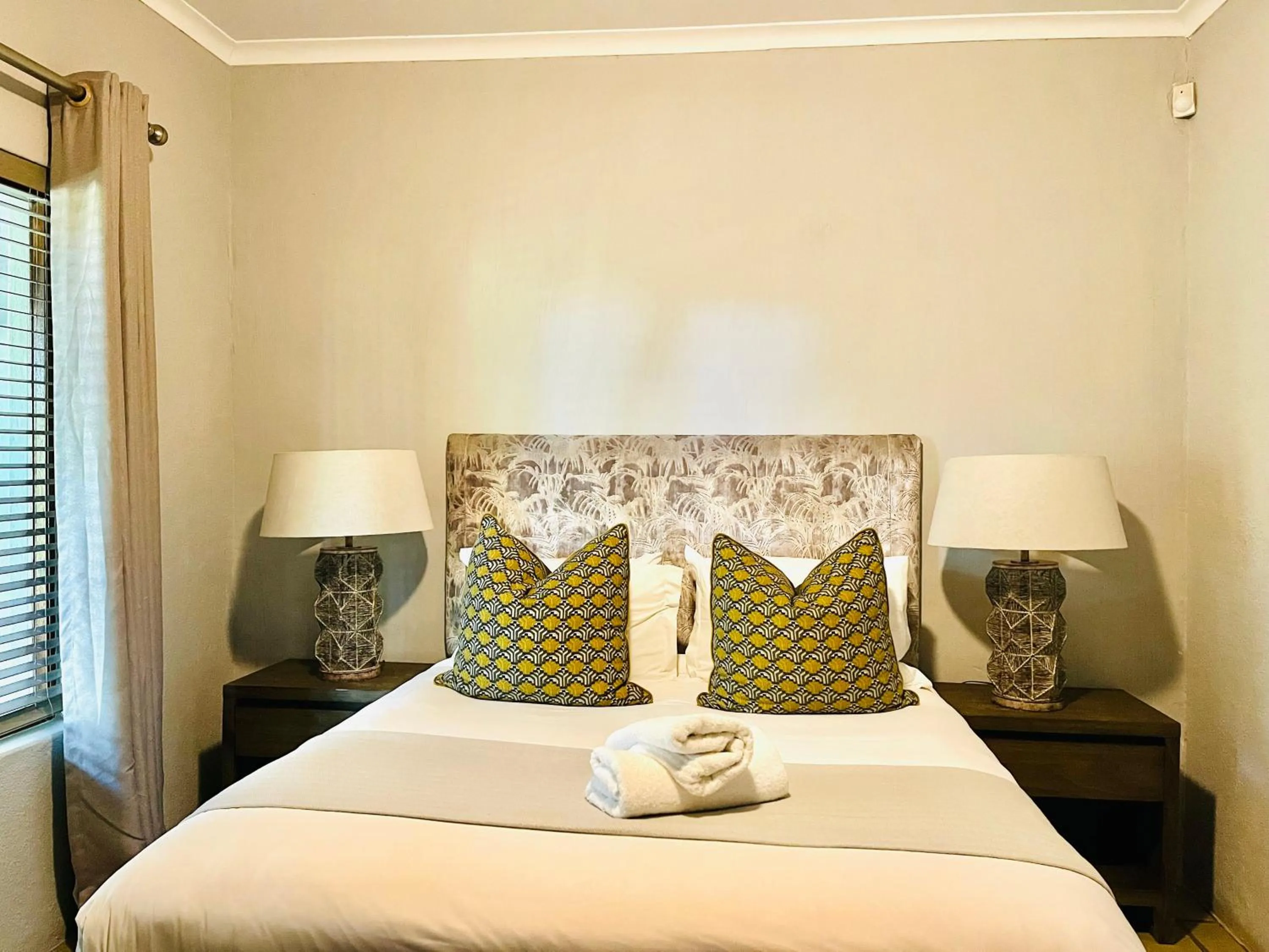 Bed in Bushbaby Valley Lodge