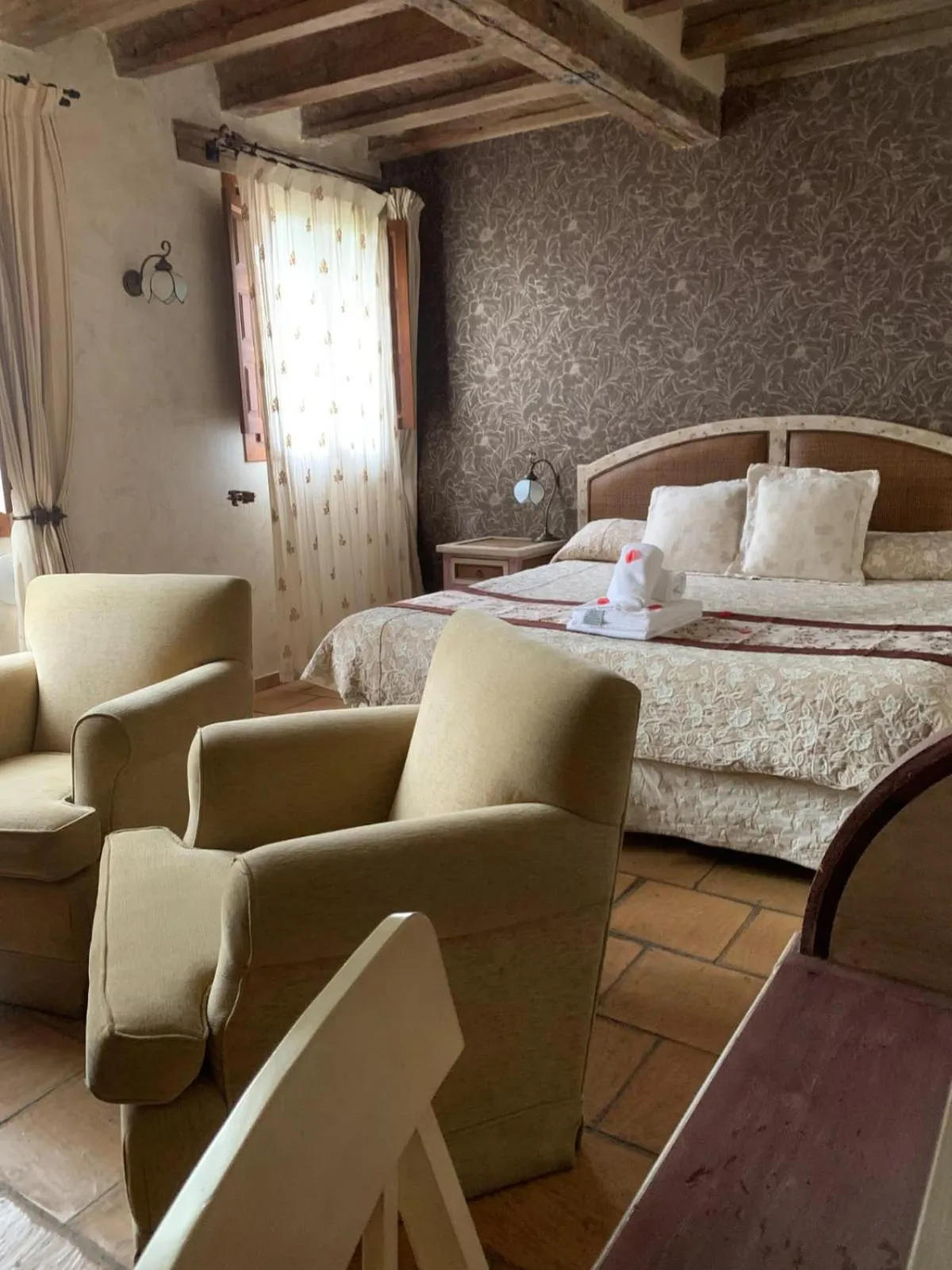 Photo of the whole room, Bed in Posada Restaurante Fuenteplateada