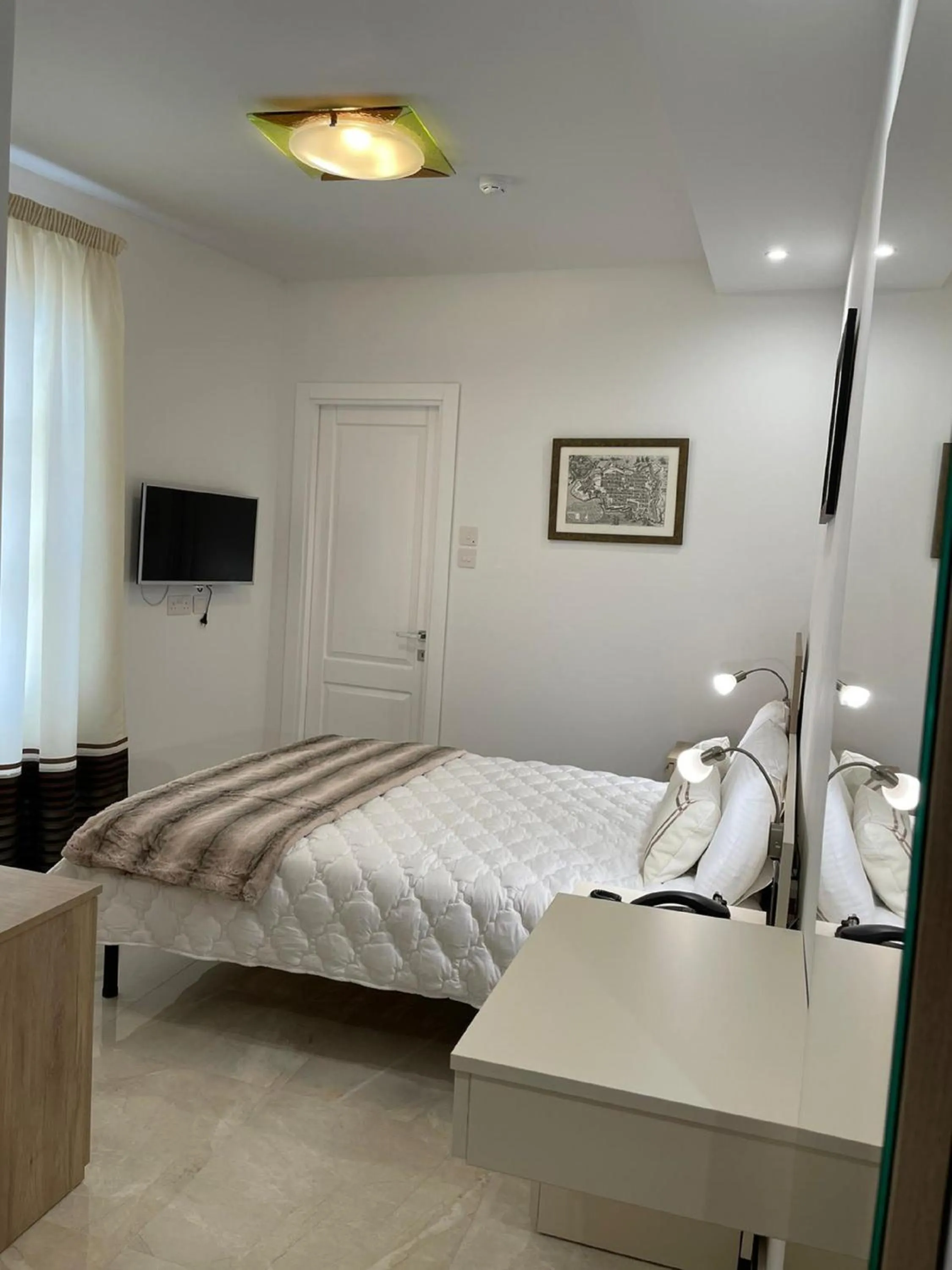 Bedroom, Bed in La Reggia Seaview Guesthouse