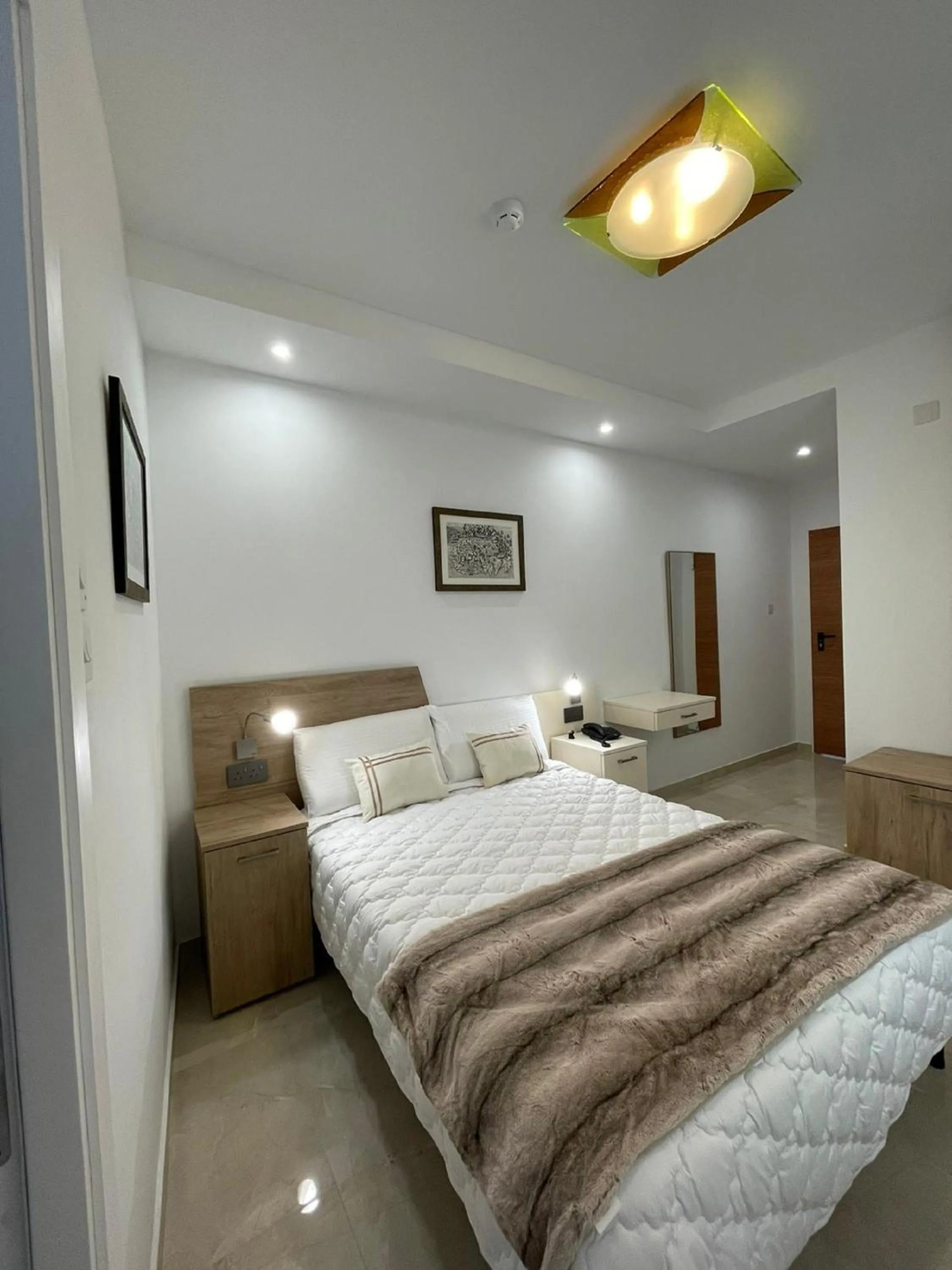 Bedroom, Bed in La Reggia Seaview Guesthouse