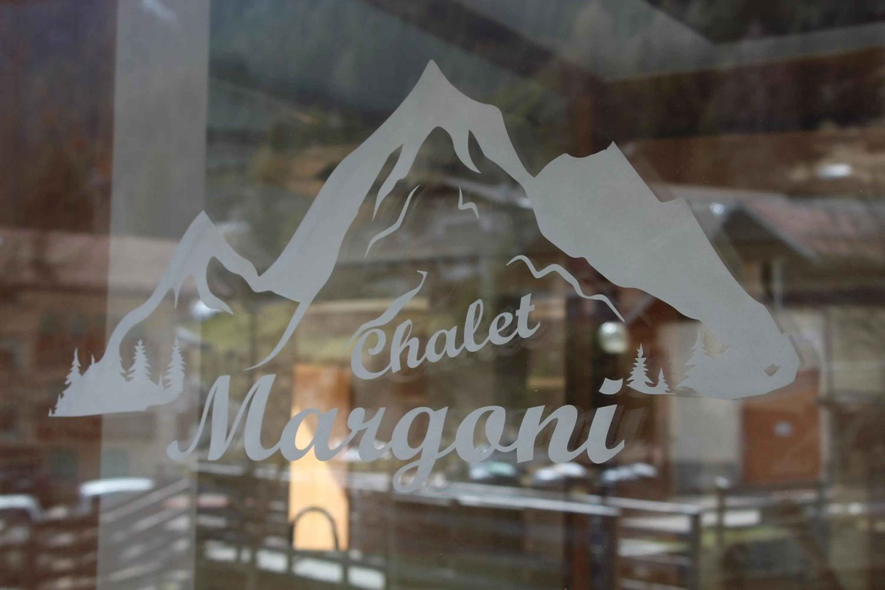 Property logo or sign in Chalet Margoni