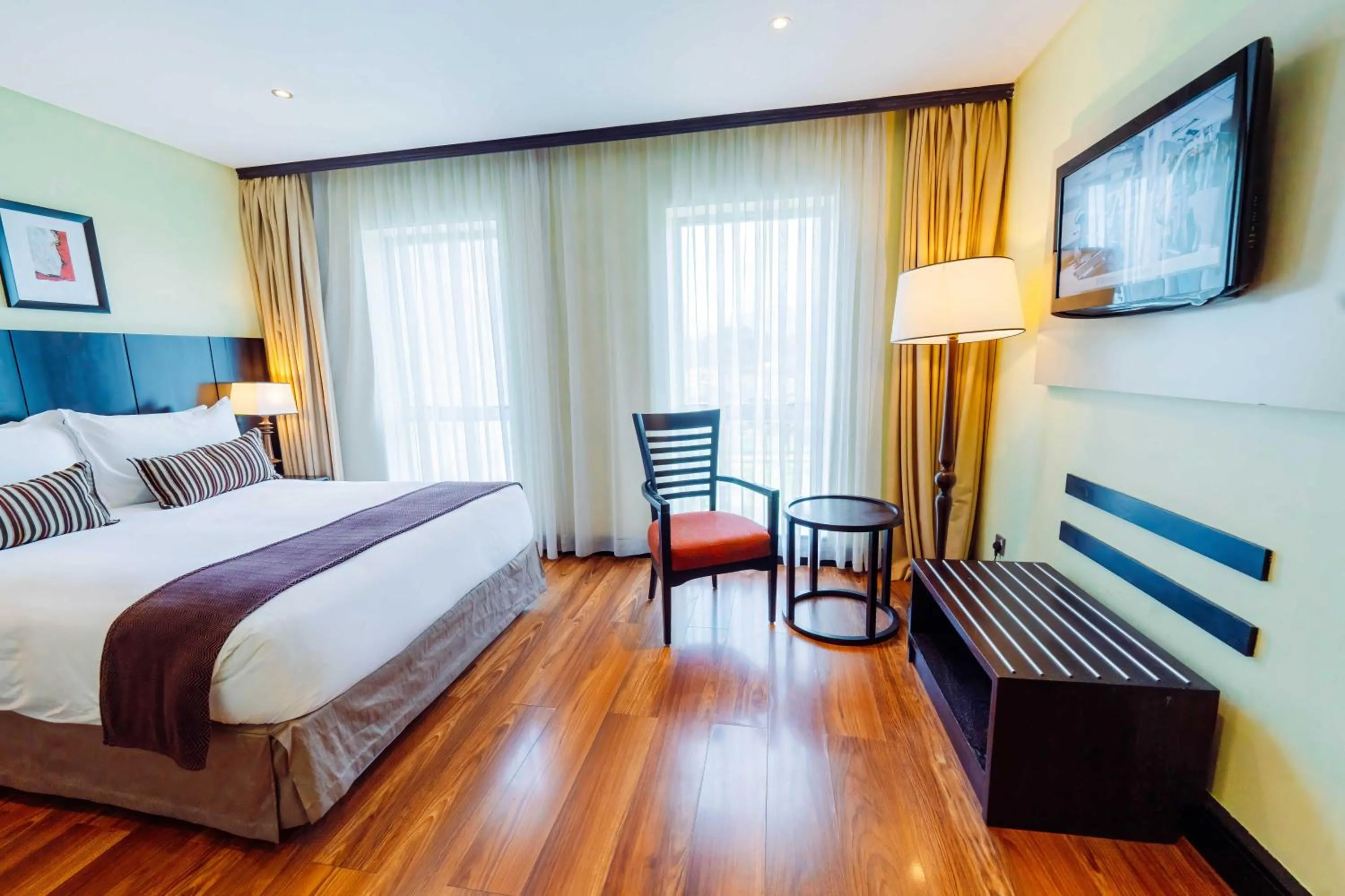 Bed in Mount Meru Hotel