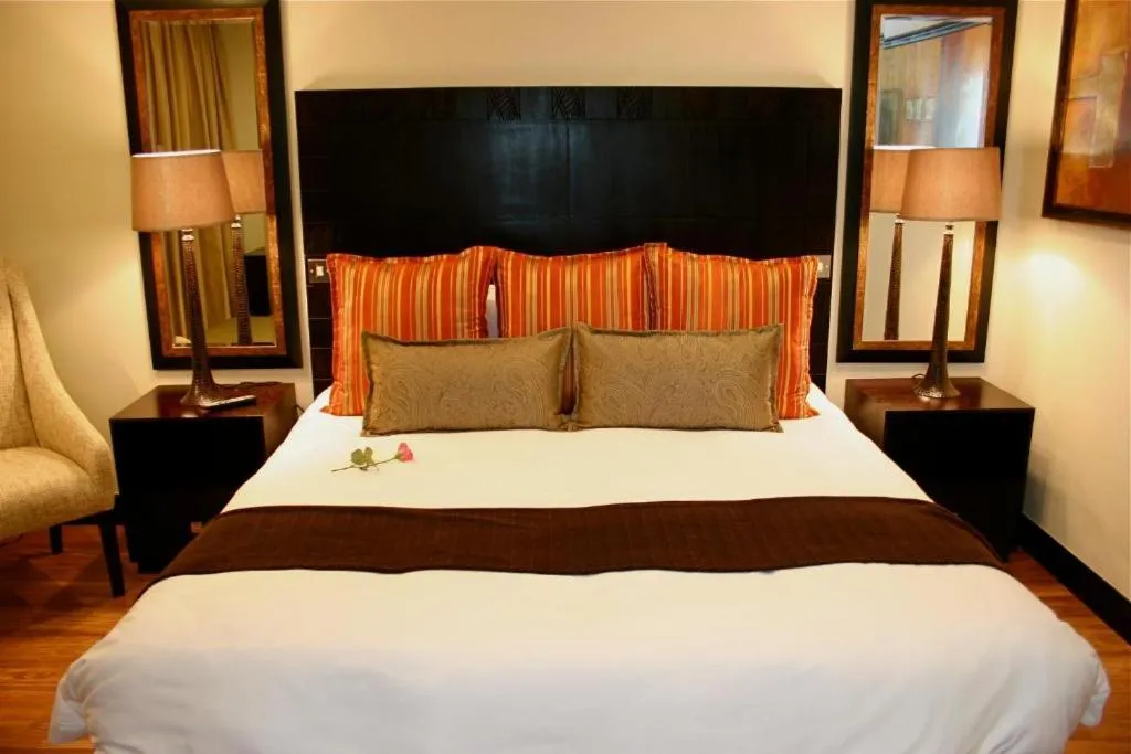 Bed in Mount Meru Hotel