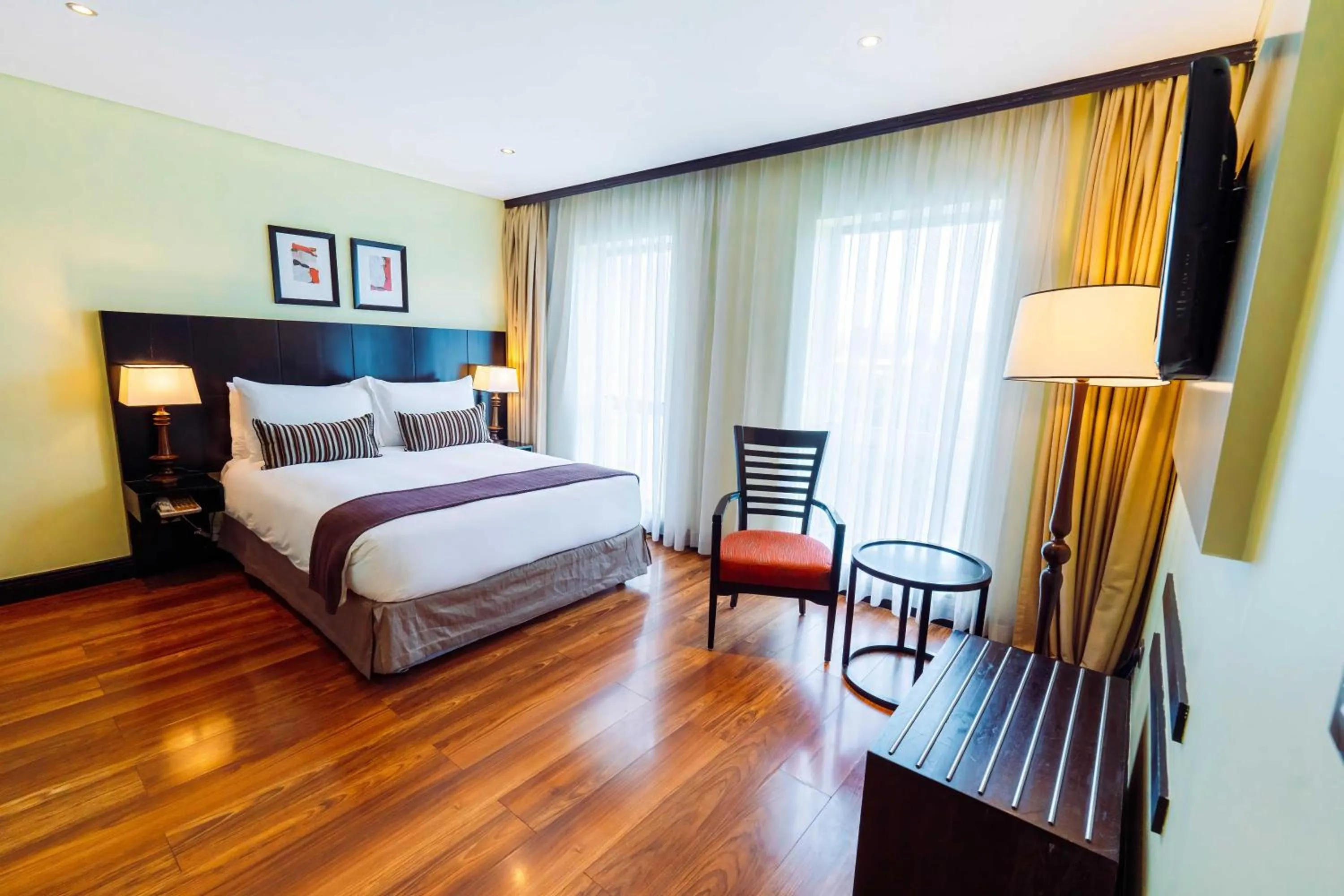 Bed in Mount Meru Hotel