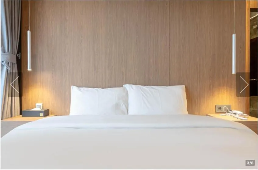 Bed in De Homme Hotel