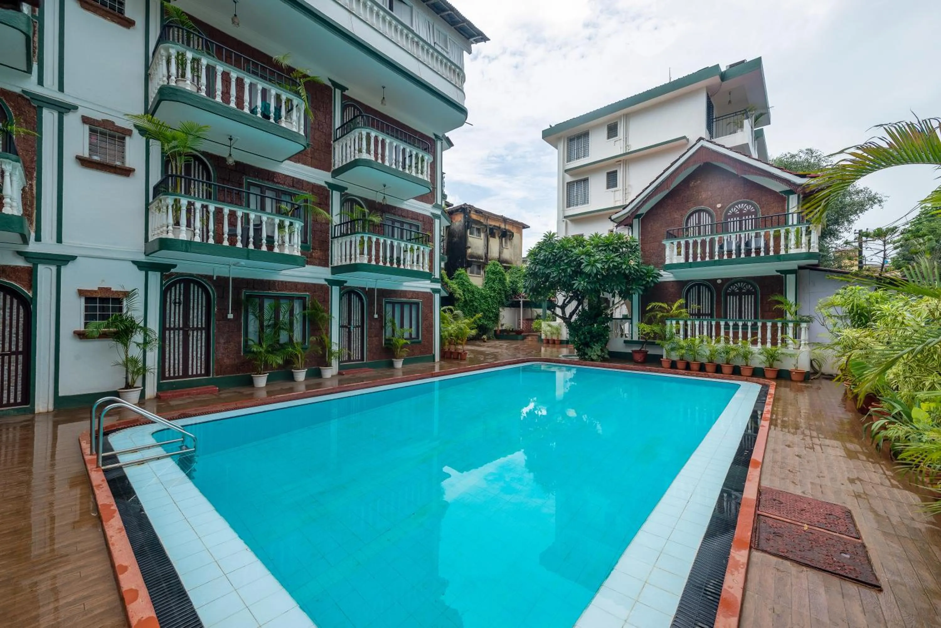 Swimming pool in Olive Zip Calangute Mira by Embassy Group