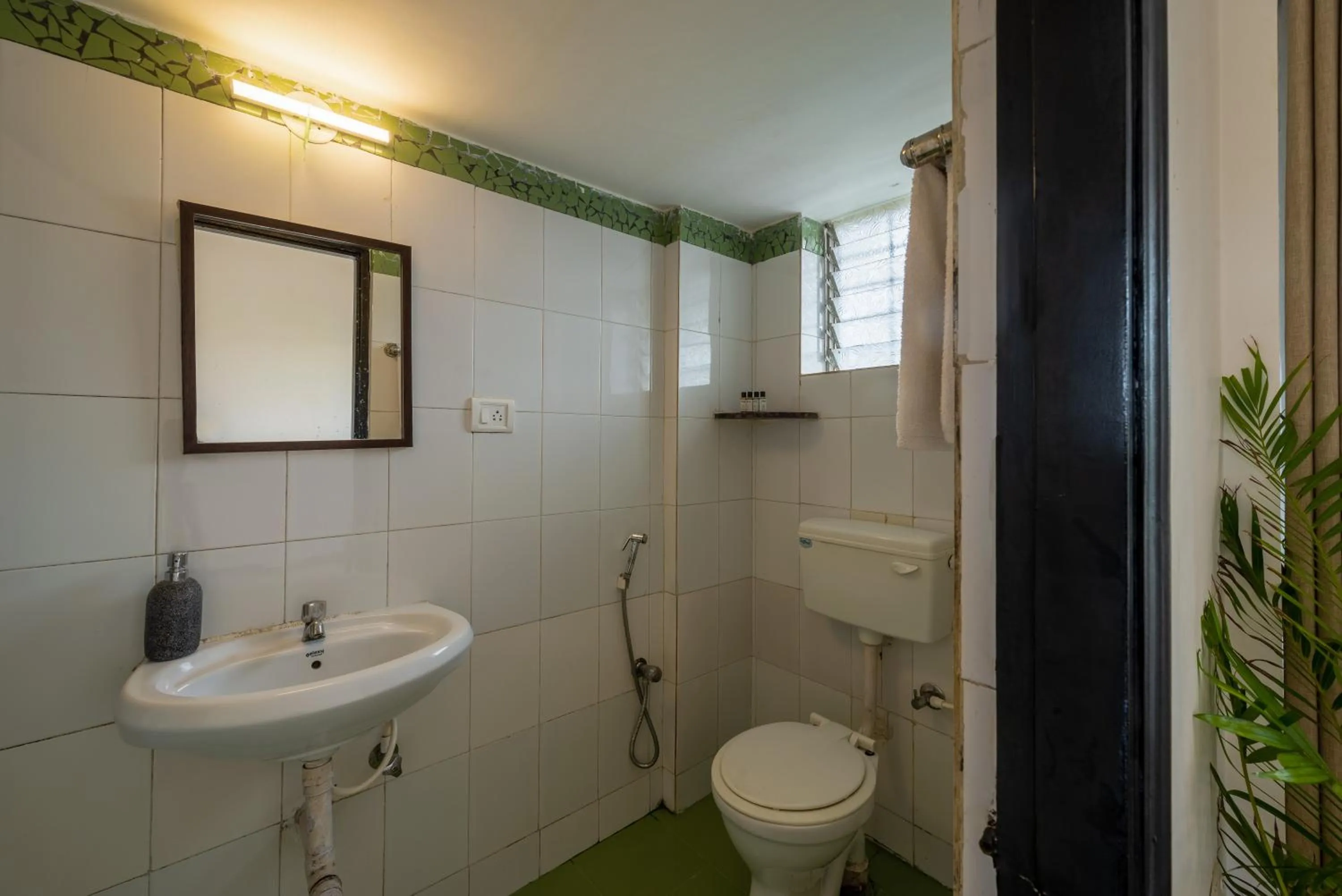 Bathroom in Olive Zip Calangute Mira by Embassy Group