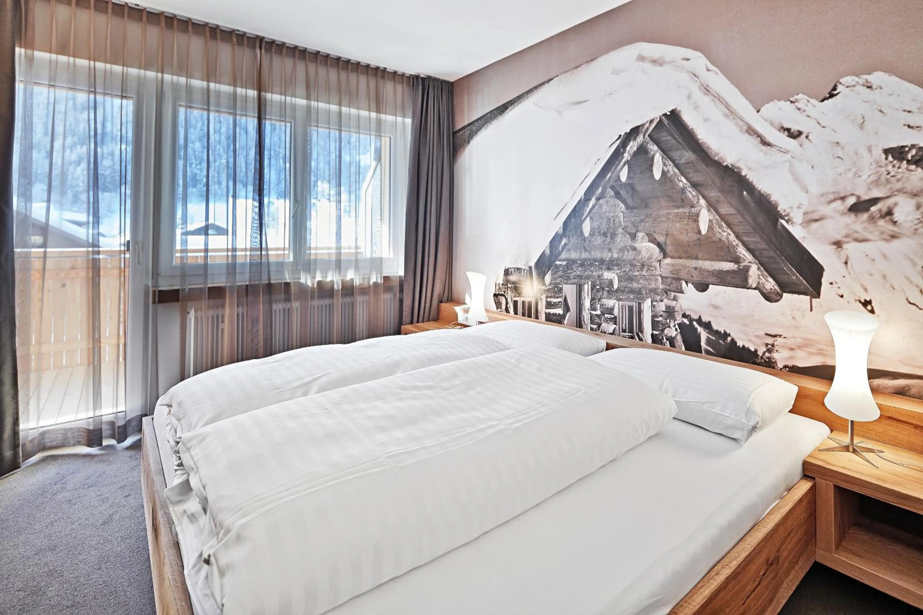 Photo of the whole room, Bed in Sporthotel Silvretta Montafon