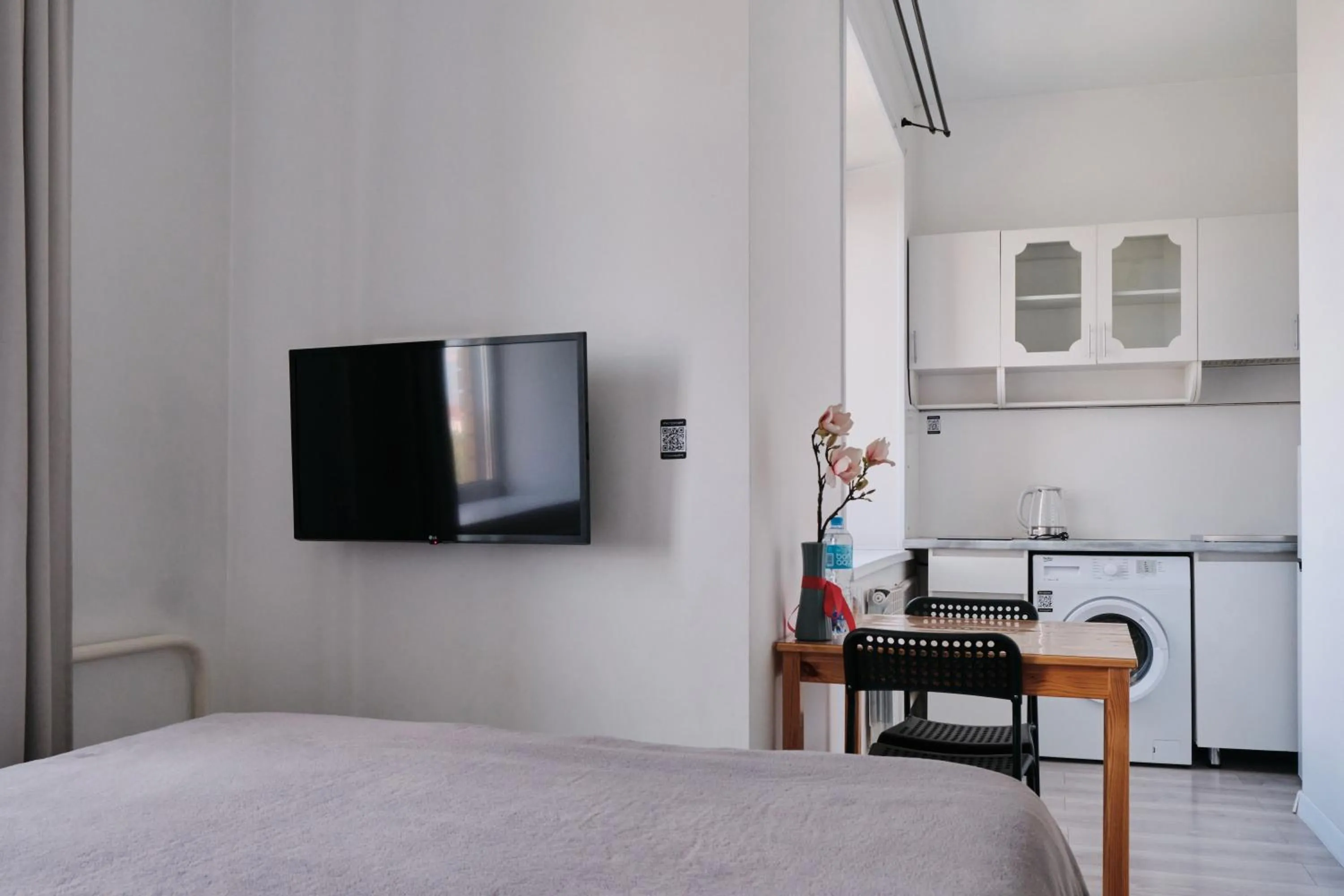 Bed in Seven City Apartments