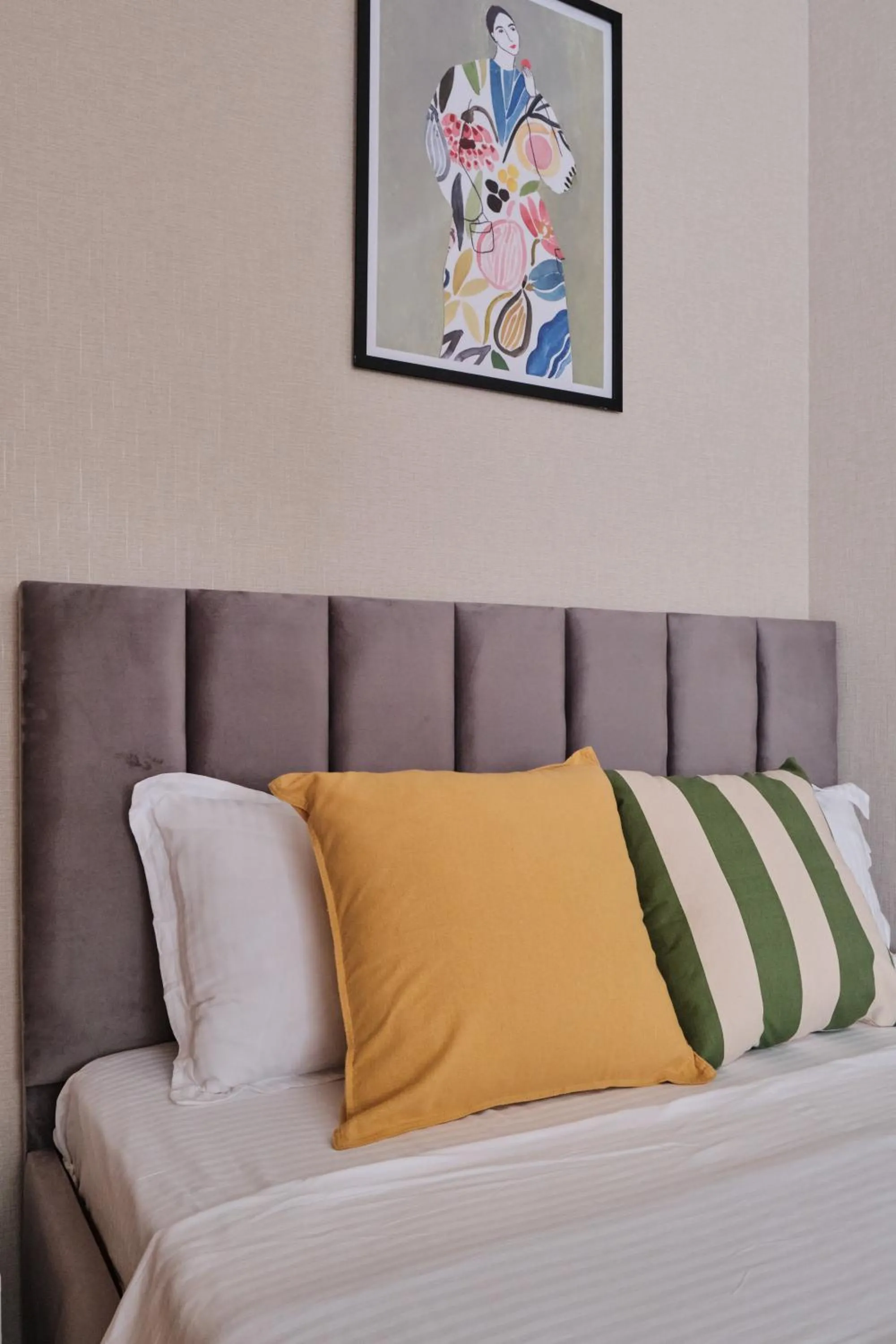 Bed in Seven City Apartments