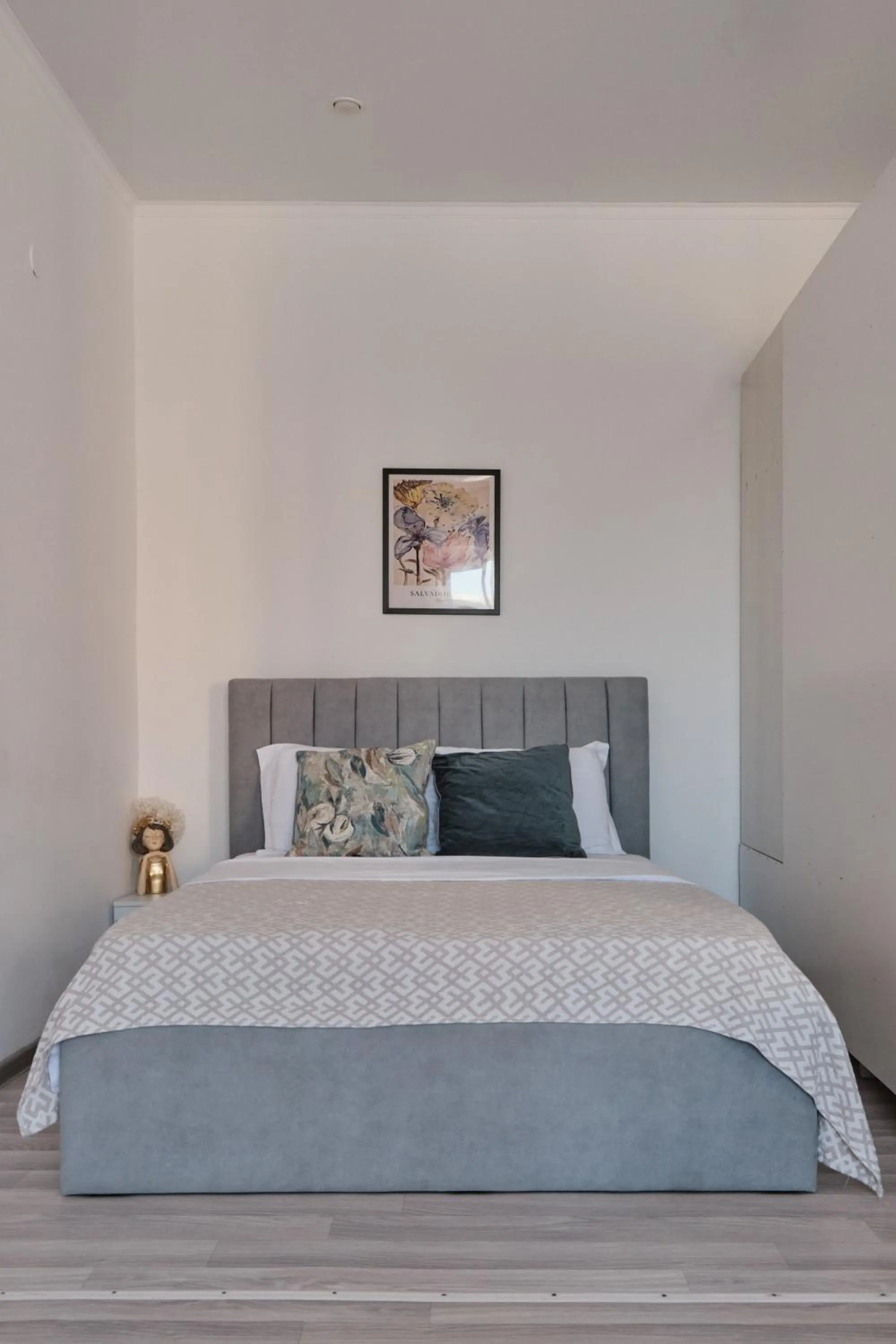 Bed in Seven City Apartments