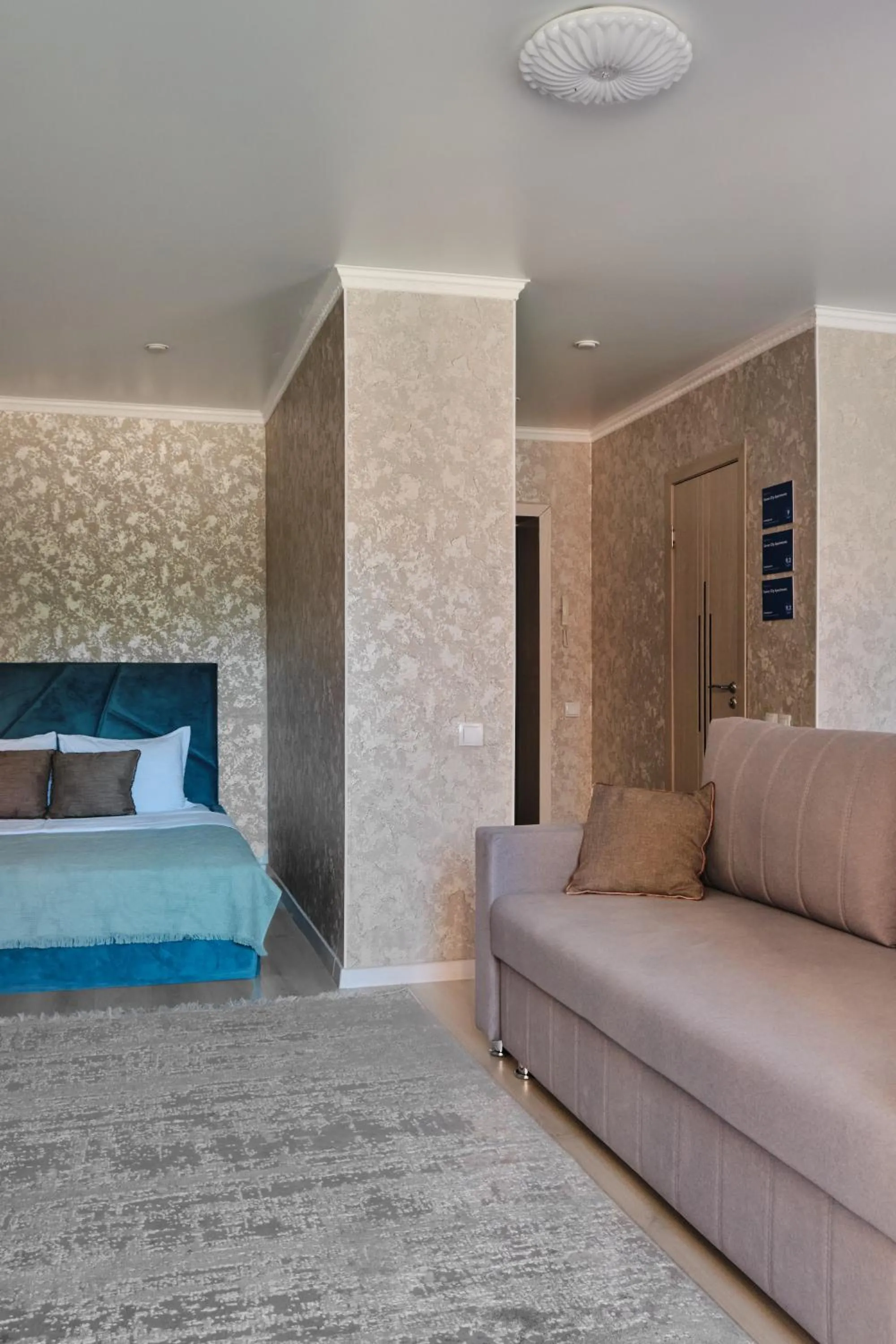 Bed in Seven City Apartments