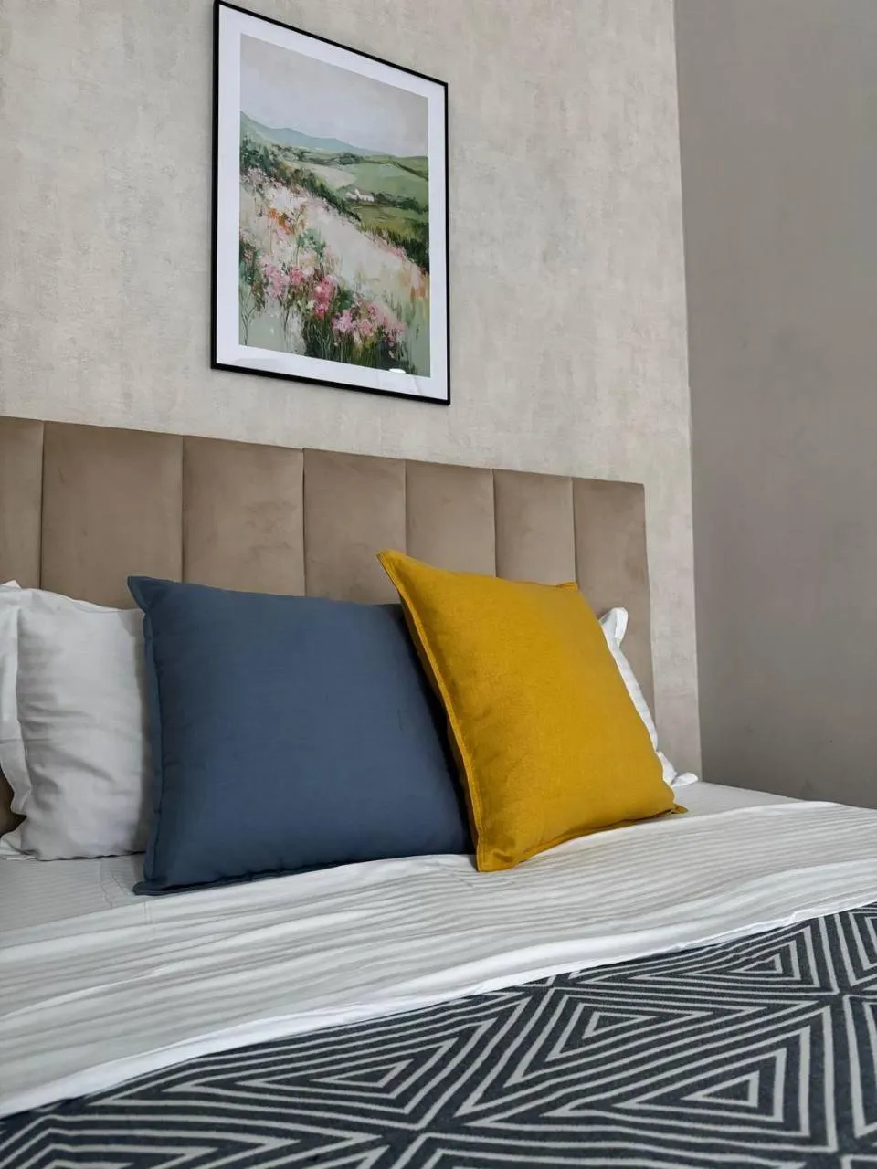 Bed in Seven City Apartments