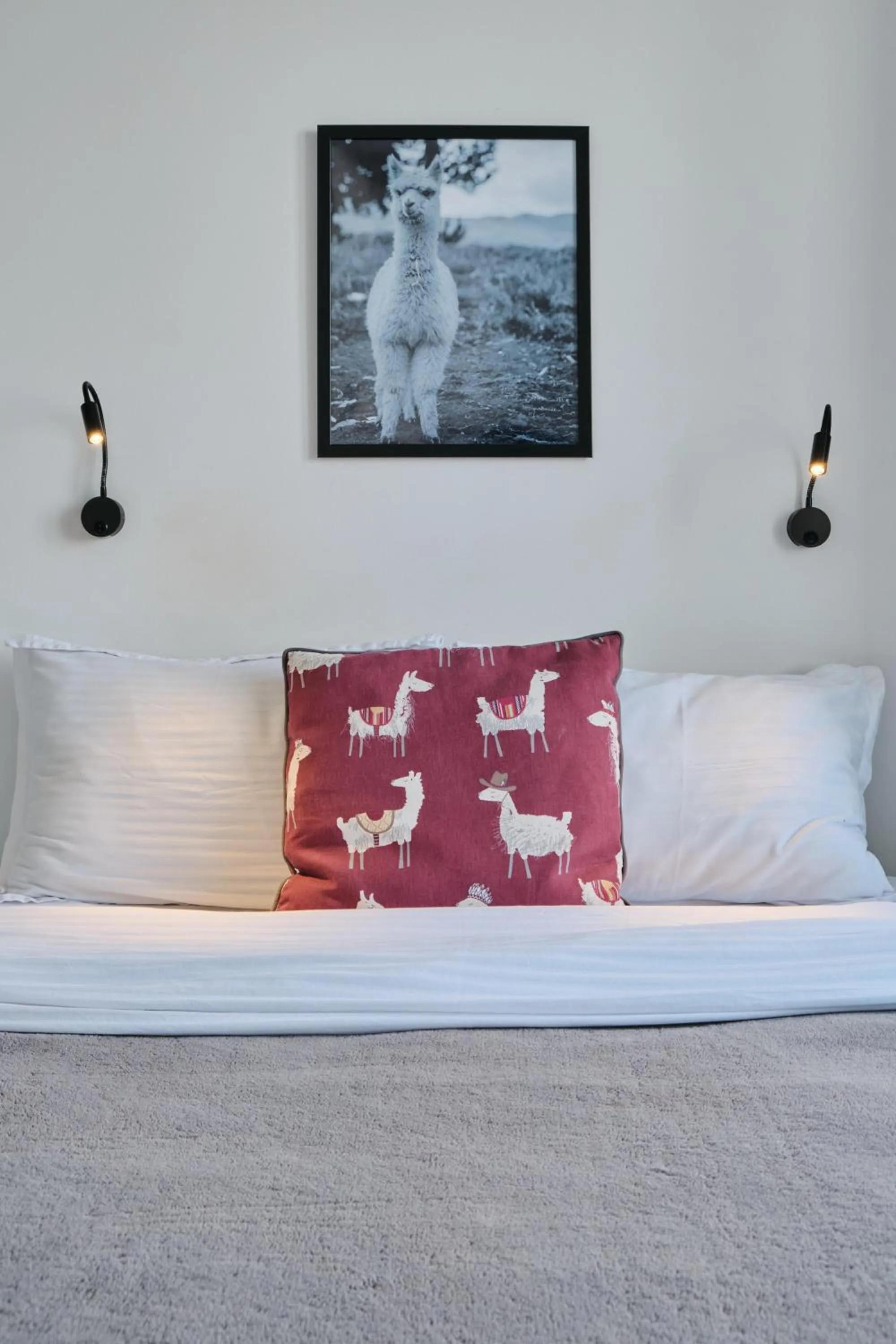 Bed in Seven City Apartments