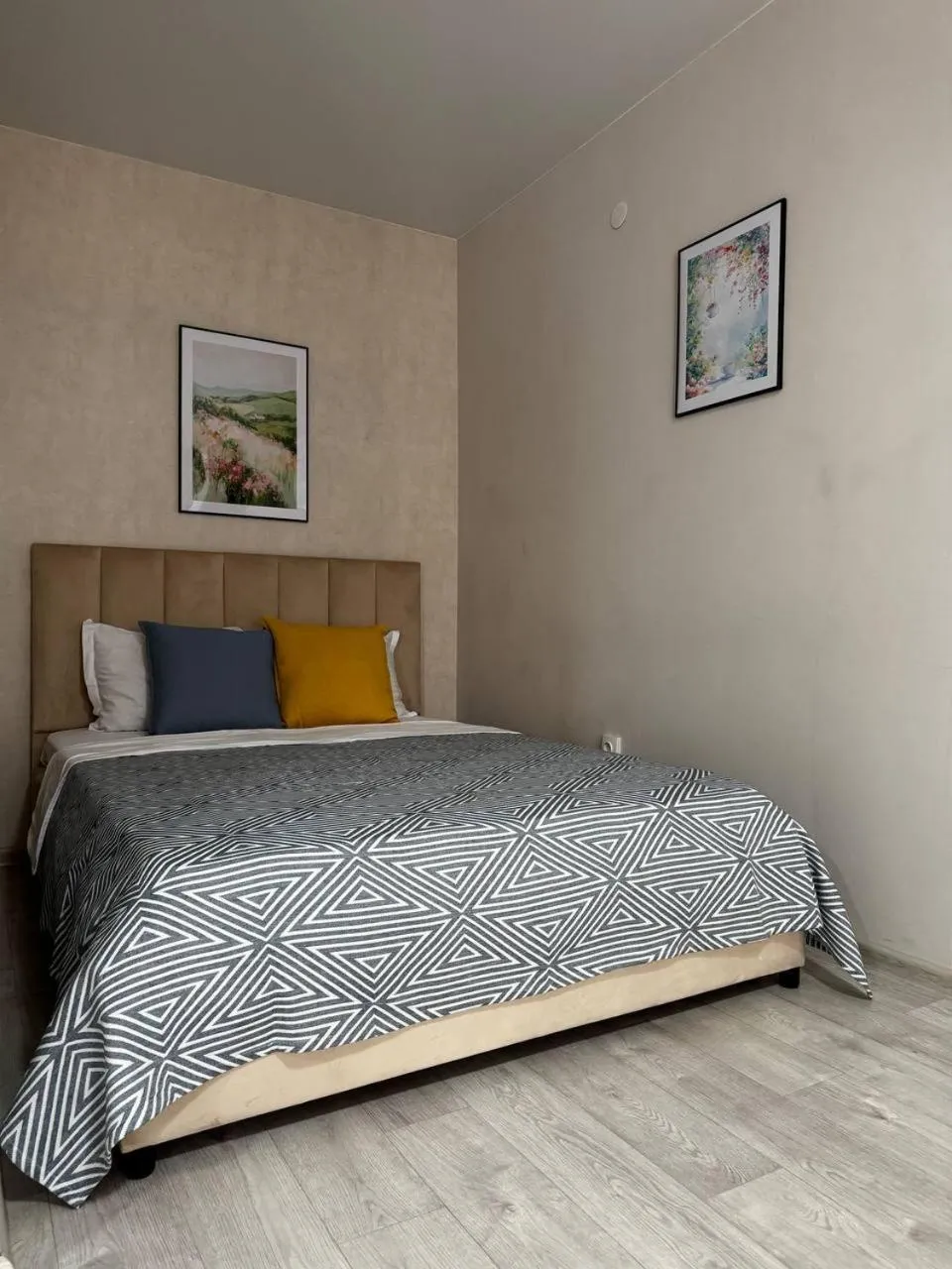 Bed in Seven City Apartments